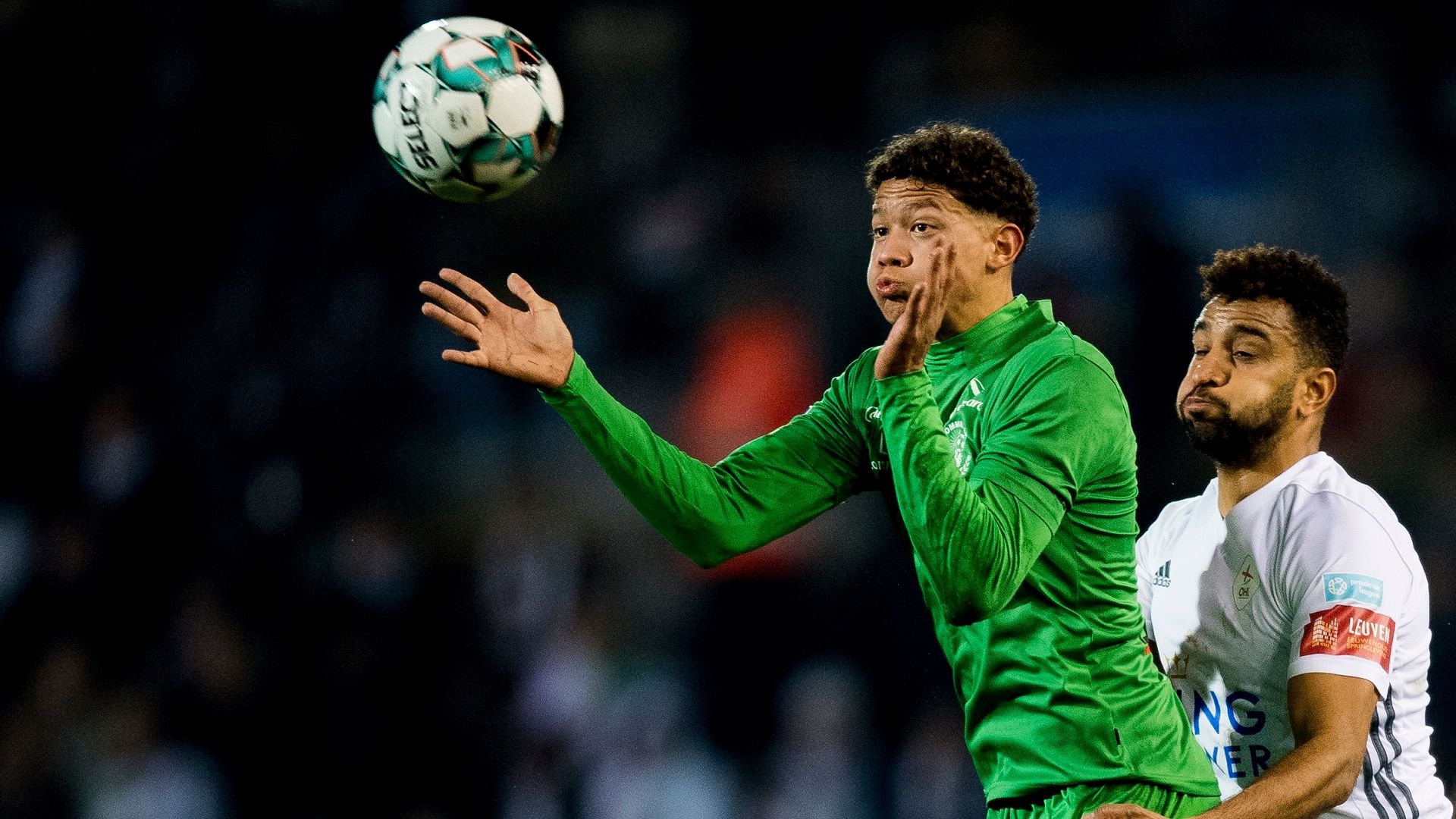 Lommel's Andras Nemeth and OHL's Pierre Yves Ngawa 08 February 2020