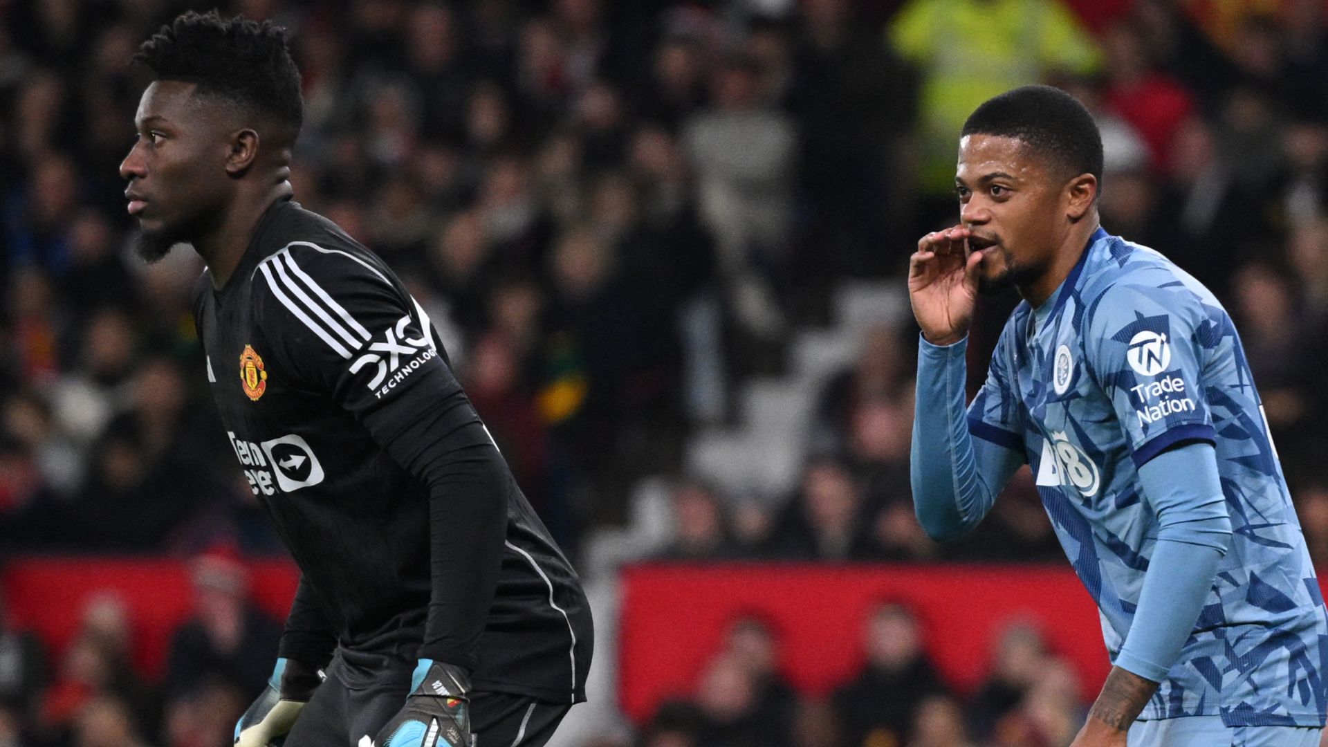 Aston Villa's Leon Bailey tries to put off Man Utd goalkeeper Andre Onana