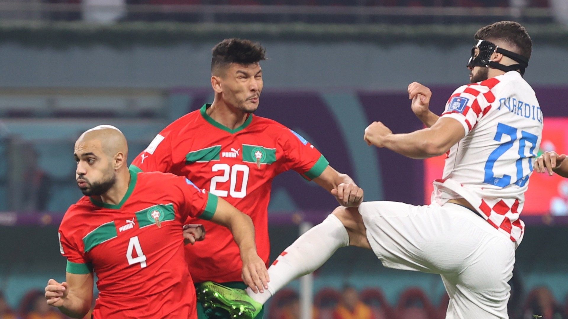 Josko Gvardiol of Croatia and Achraf Dari, Sofyan Amrabat of Morocco