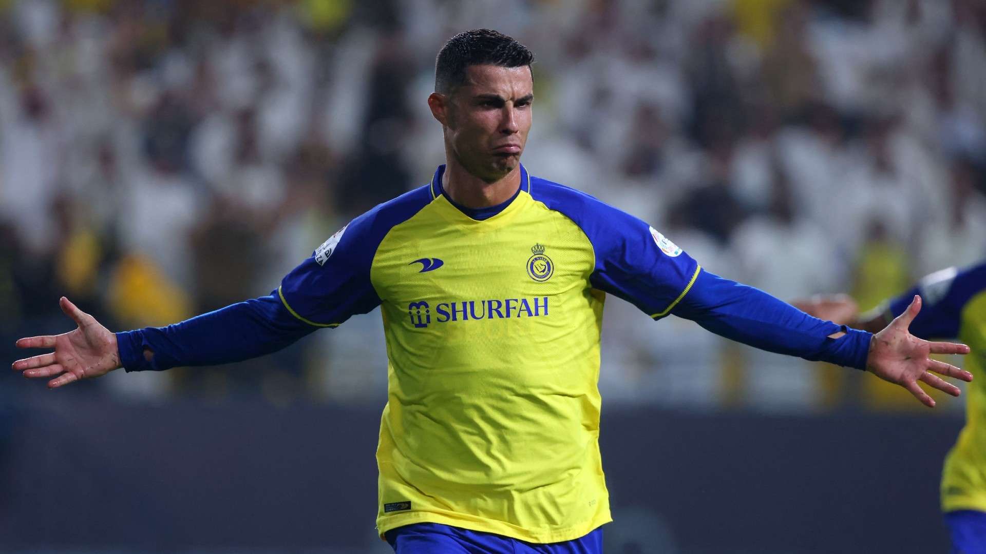 Nassr's Portuguese forward Cristiano Ronaldo reacts after scoring