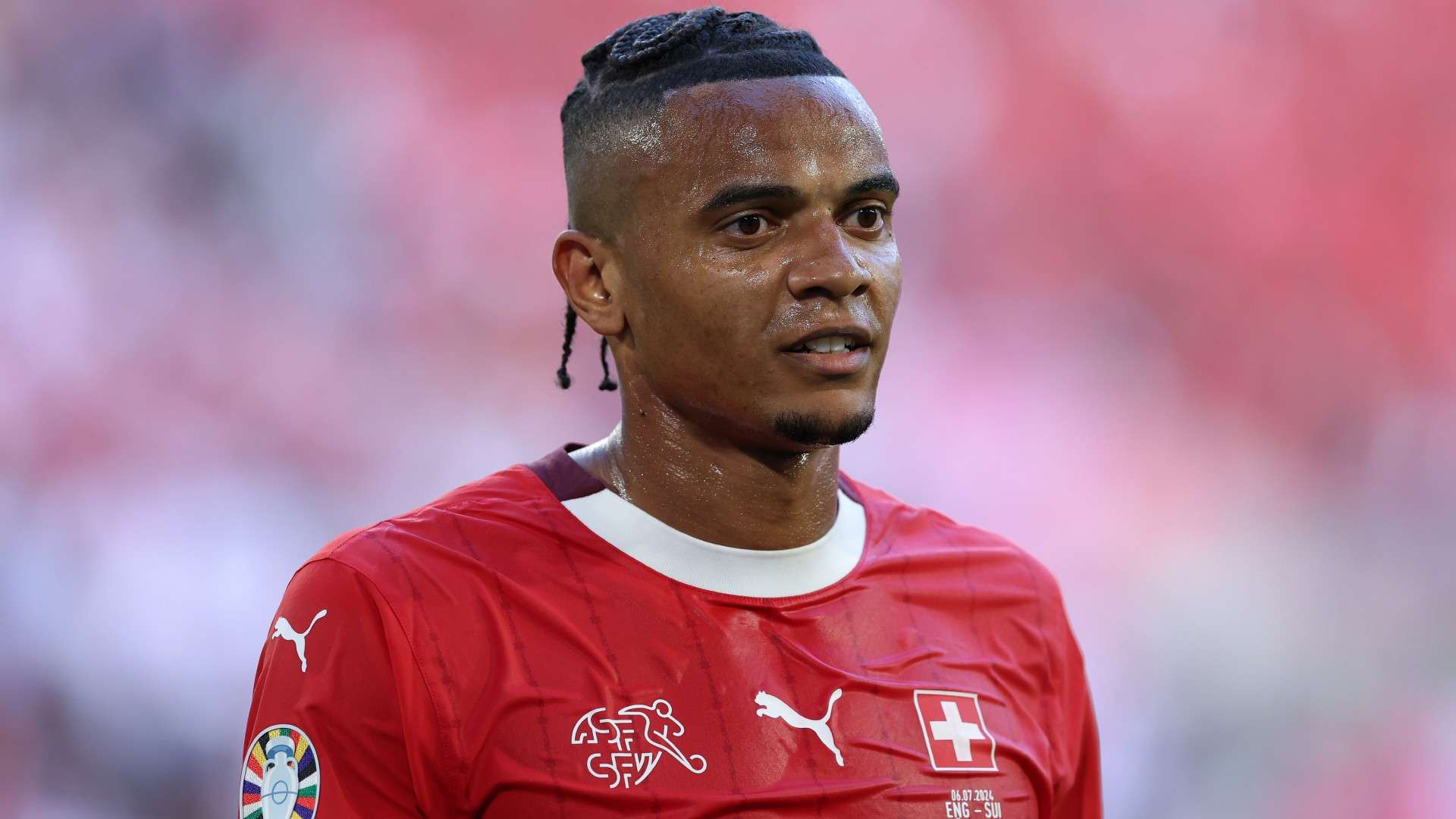 Manuel Akanji of Switzerland looks on