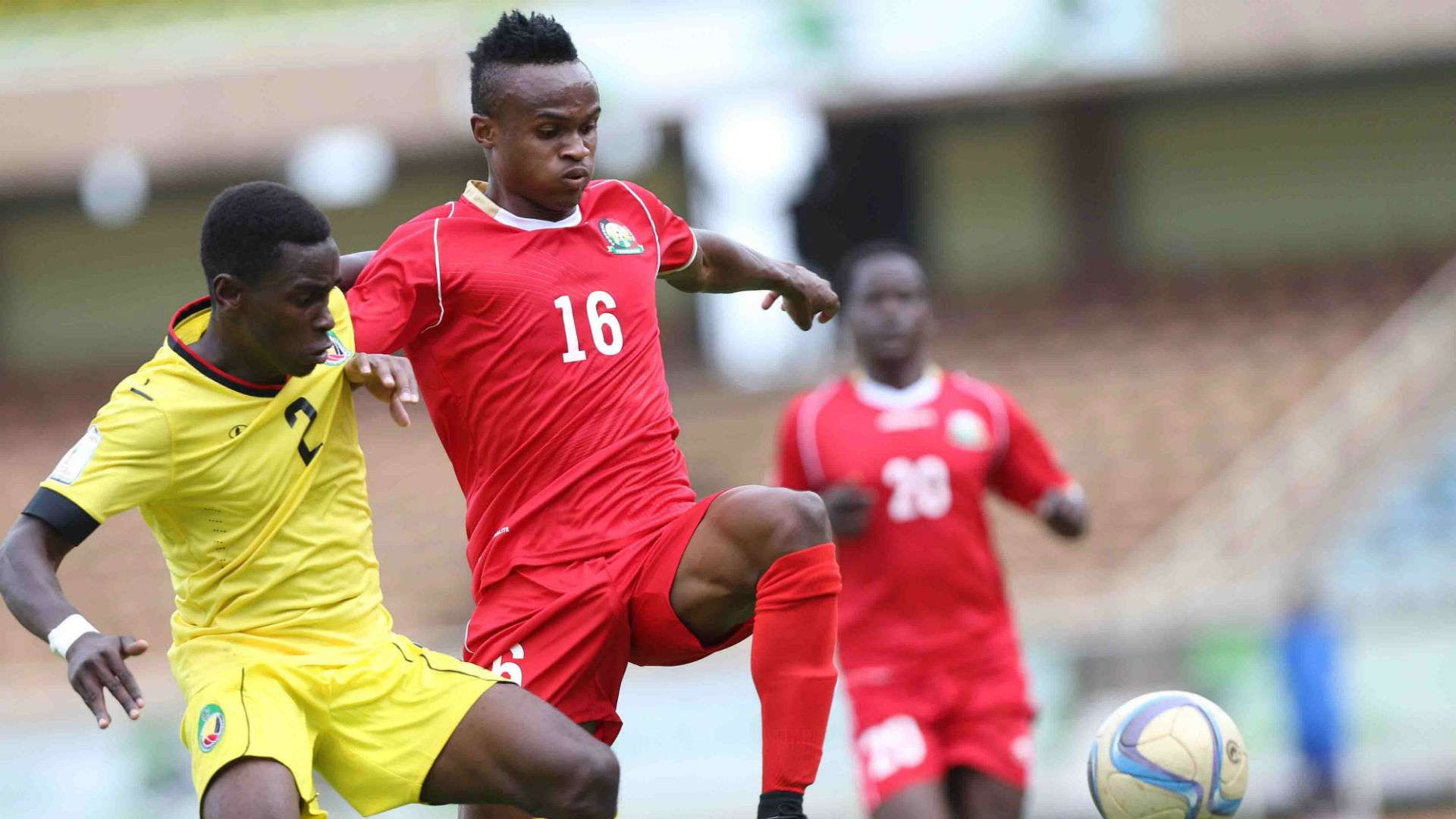 Clifton Miheso of Kenya and Harambee Stars tackle Bhehu Jamuacio.