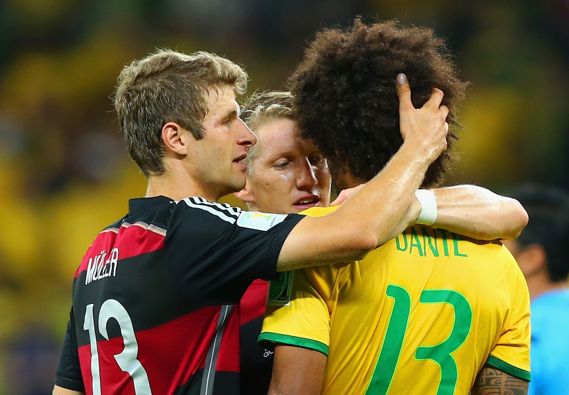 Thomas Muller and Schweinsteiger consolate Dante Brazil Germany 2014 World Cup 07082014