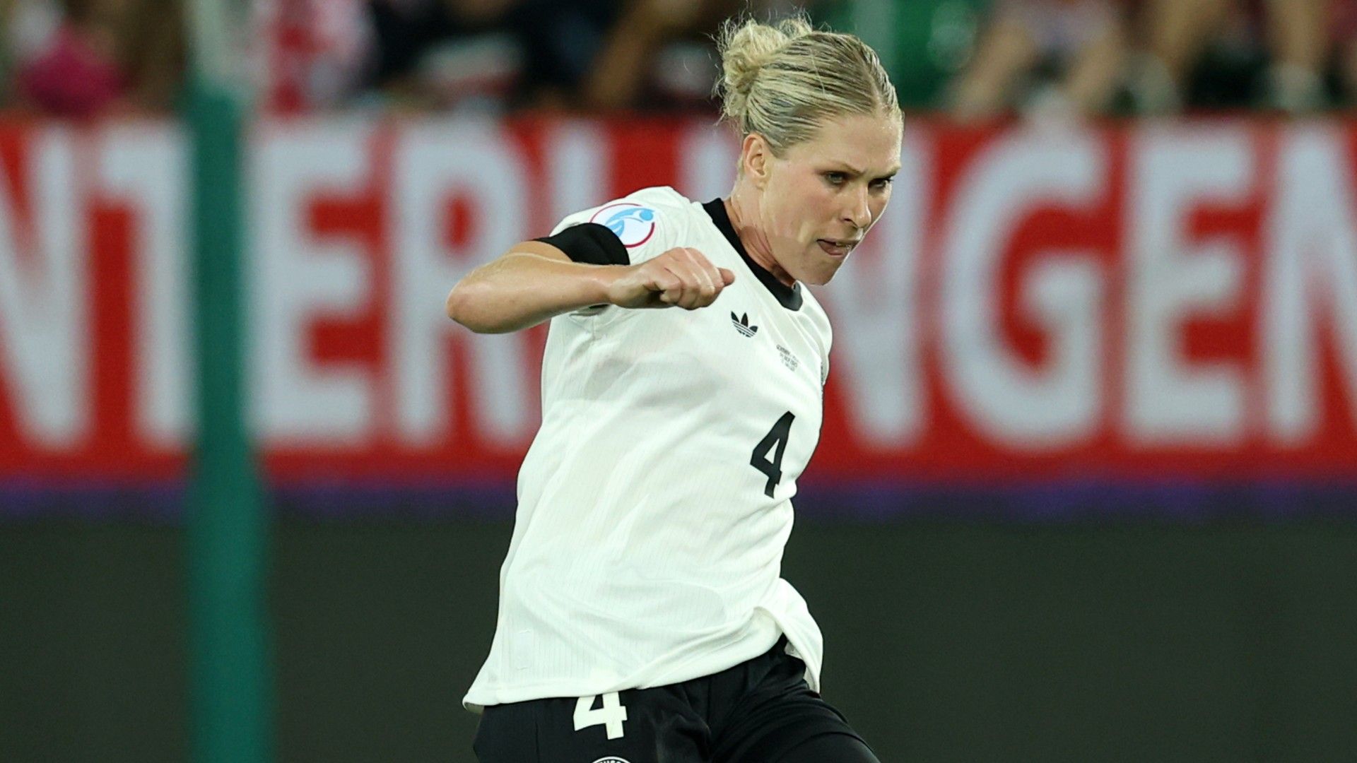 Rebecca Knaak of Germany passes the ball