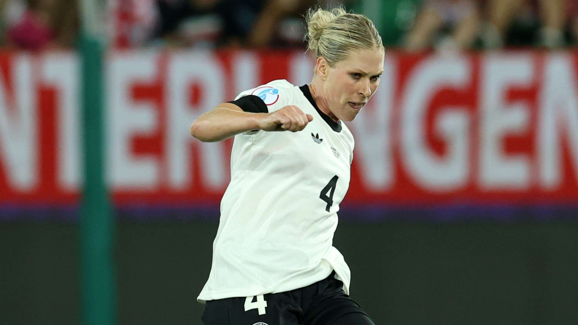 Rebecca Knaak of Germany passes the ball