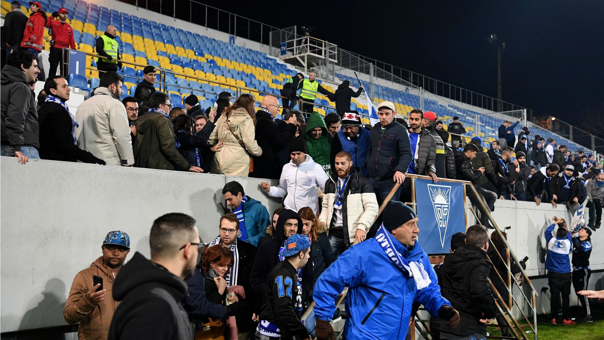 Estoril Porto fans evacuate the stands
