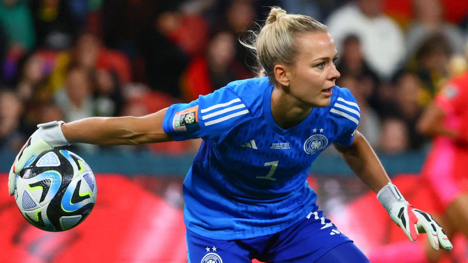 Germany's goalkeeper #01 Merle Frohms throws the ball