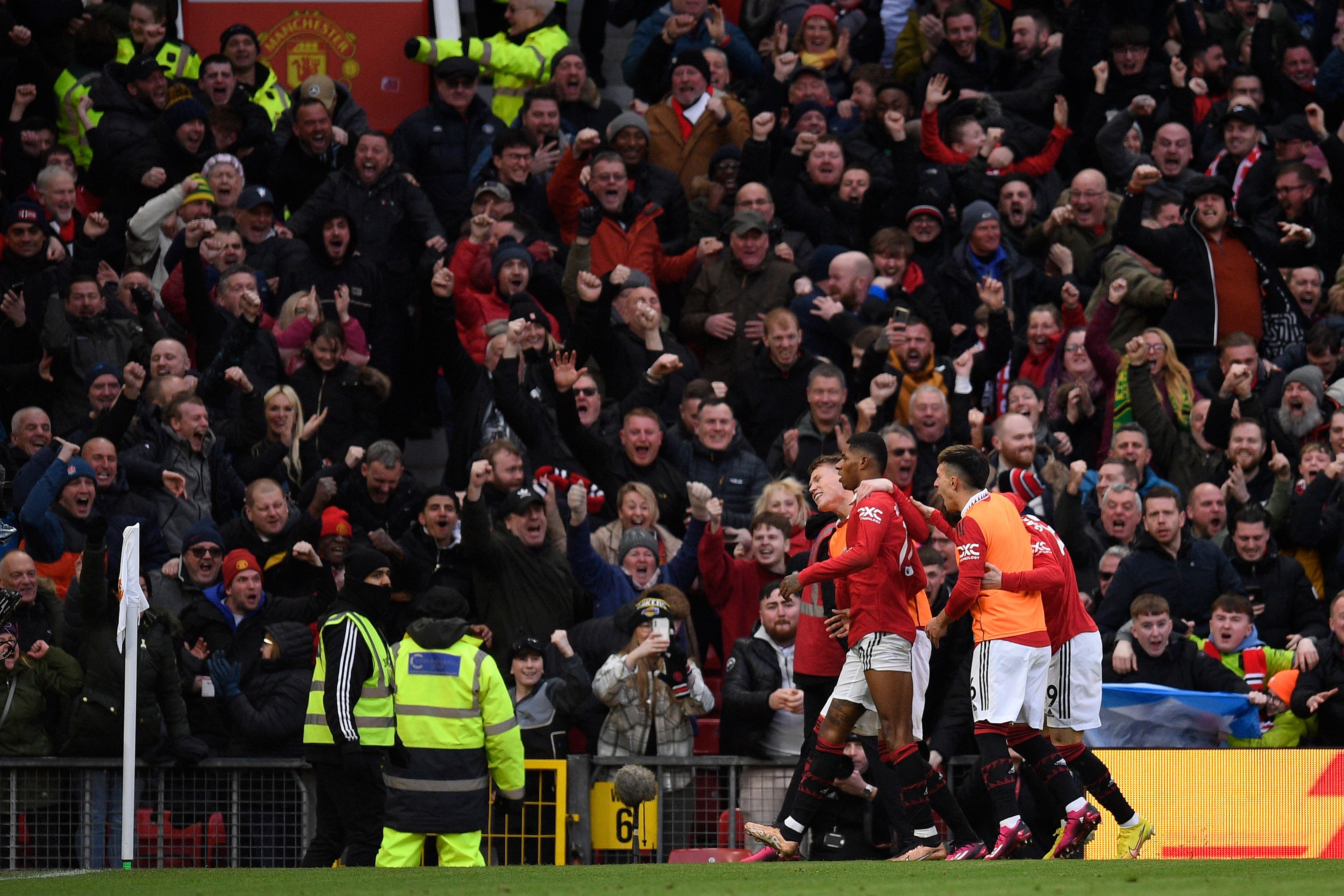 Manchester United celebrate with fans