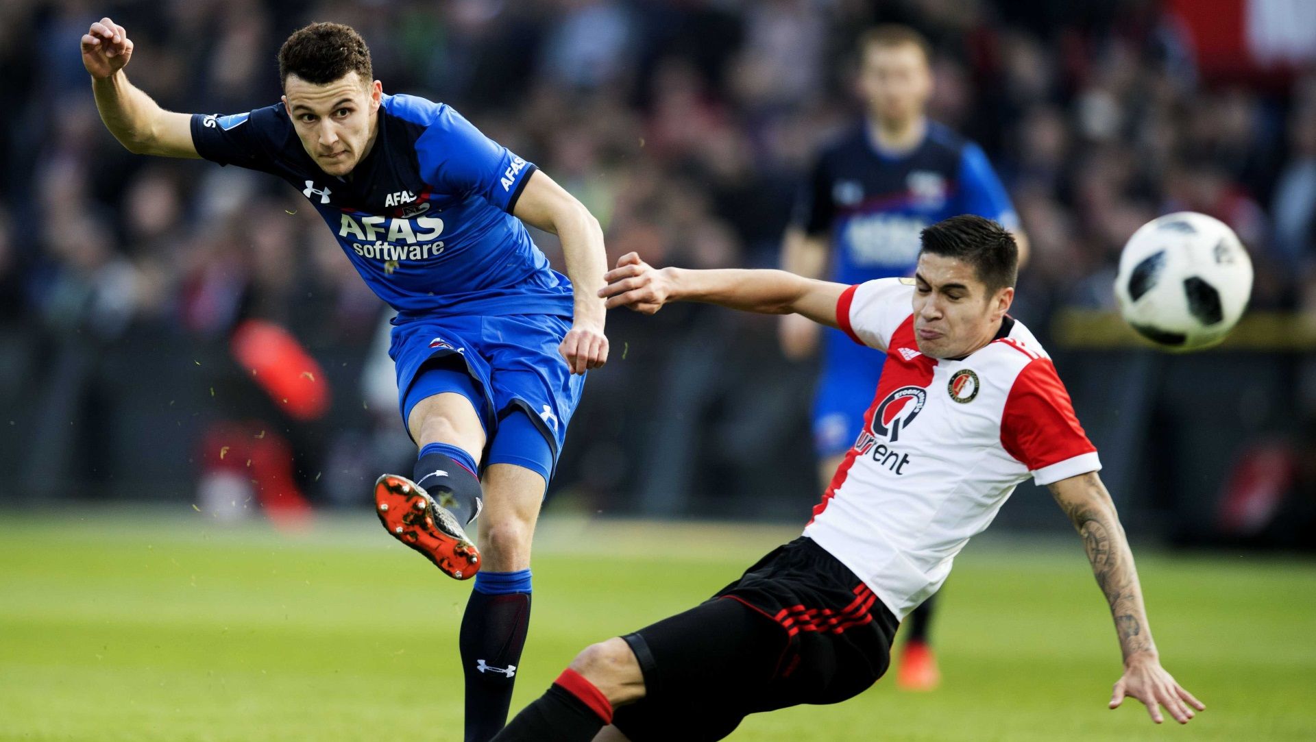 Oussama Idrissi of AZ, and Feyenoord's Kevin Diks