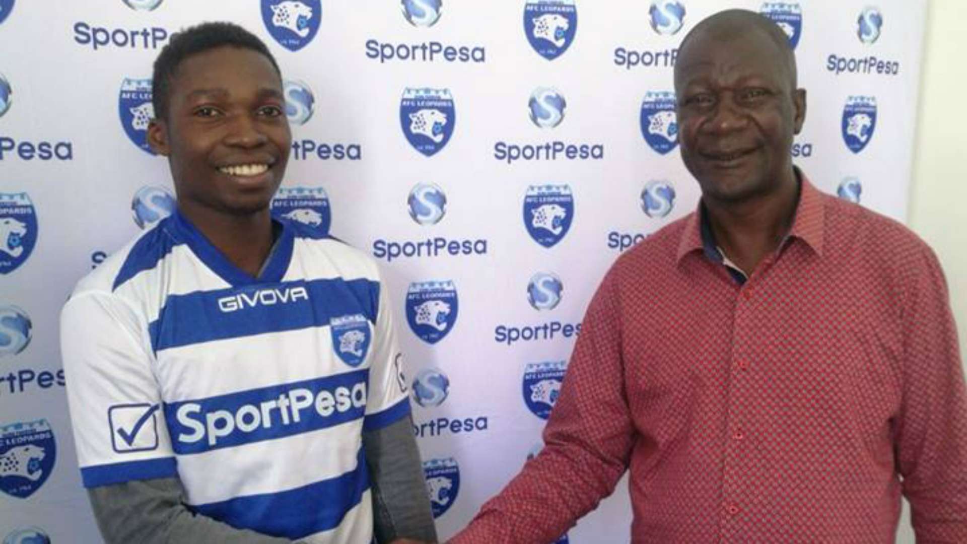 AFC Leopards coach Robert Matano and new signing.j
