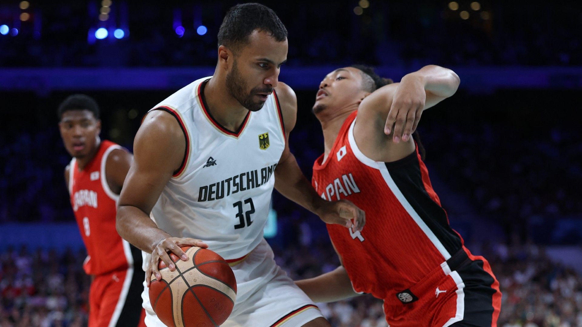 Germany's #32 Johannes Thiemann challenges Japan's #04 Akira Jacobs 