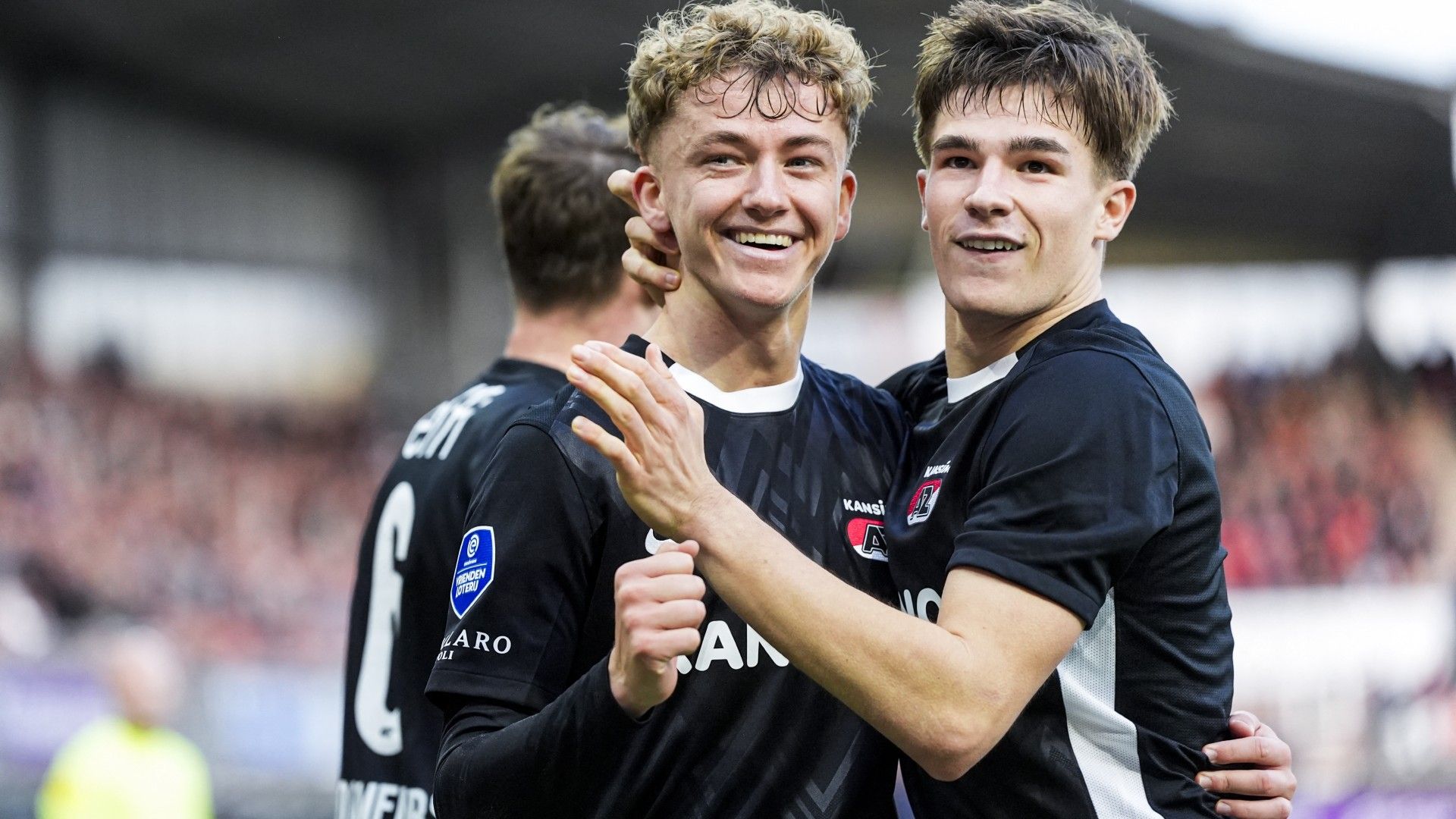 Alkmaar's Dutch midfielder #16 Sven Mijnans (L) and Alkmaar's Dutch defender #03 Wouter Goes