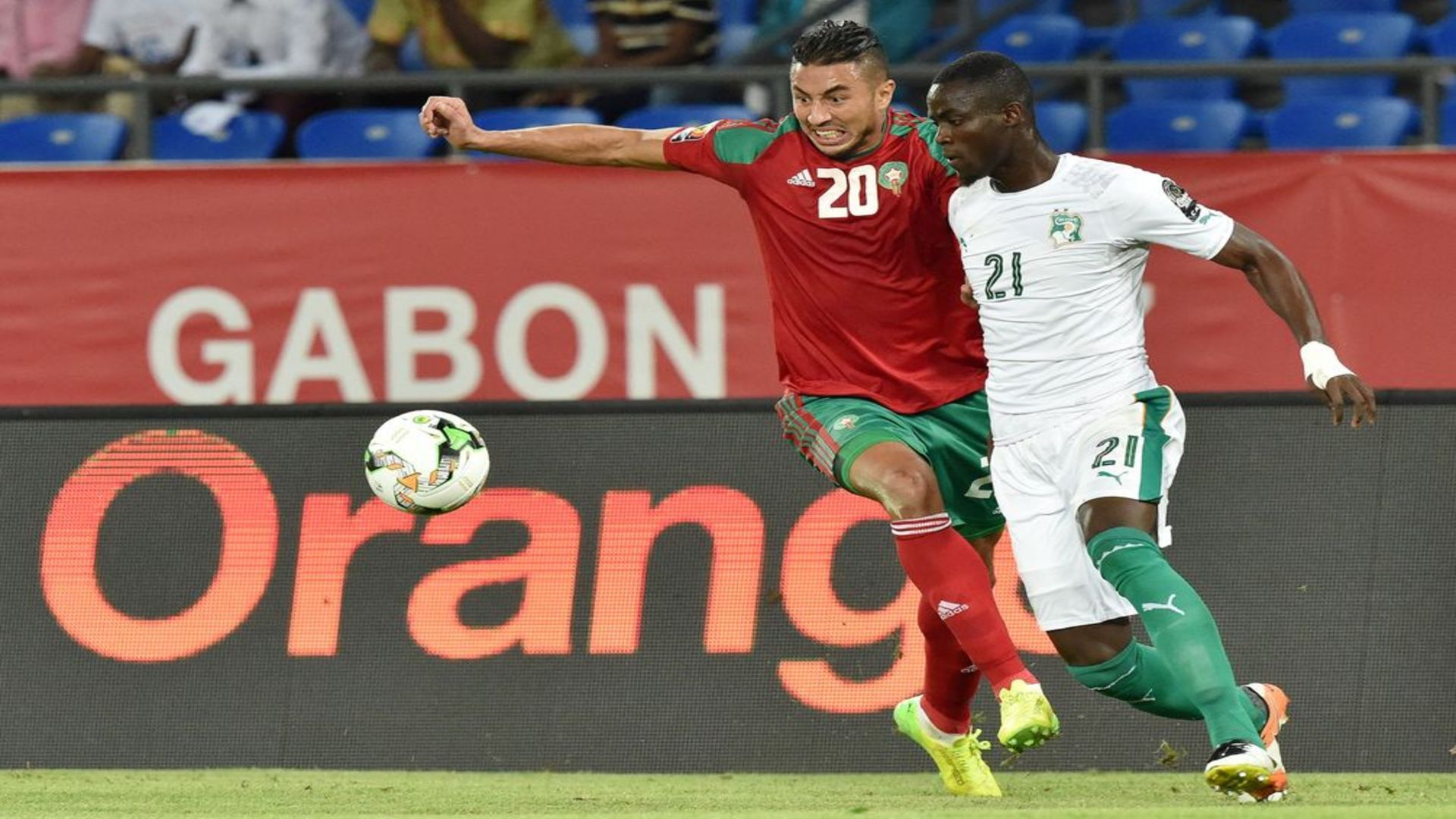 Morocco's Aziz Bouhaddouz & Ivory Coast's Eric Bailly.jpg