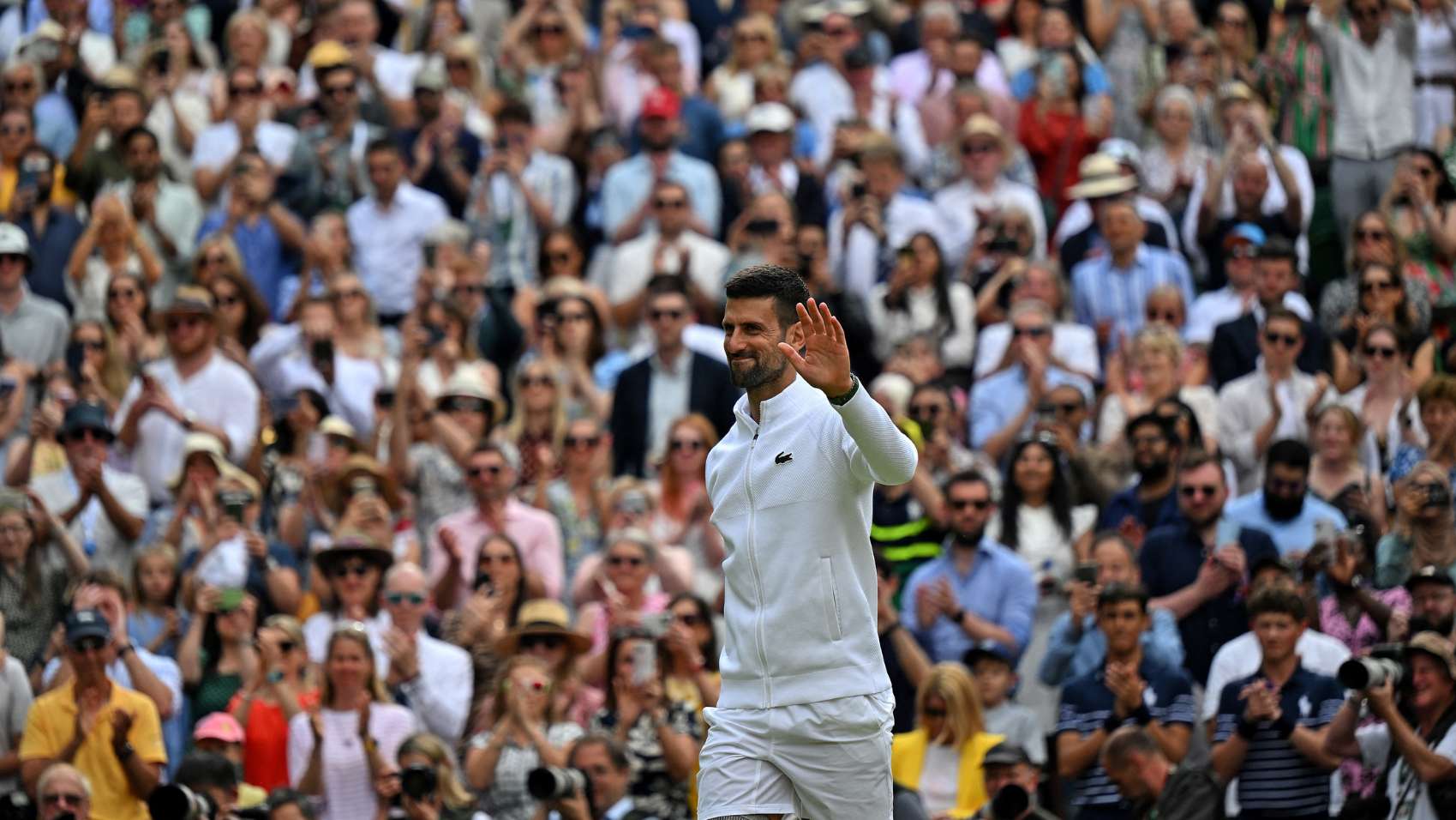 Novak Djokovic waves to the crowd The Championships Wimbledon 2024