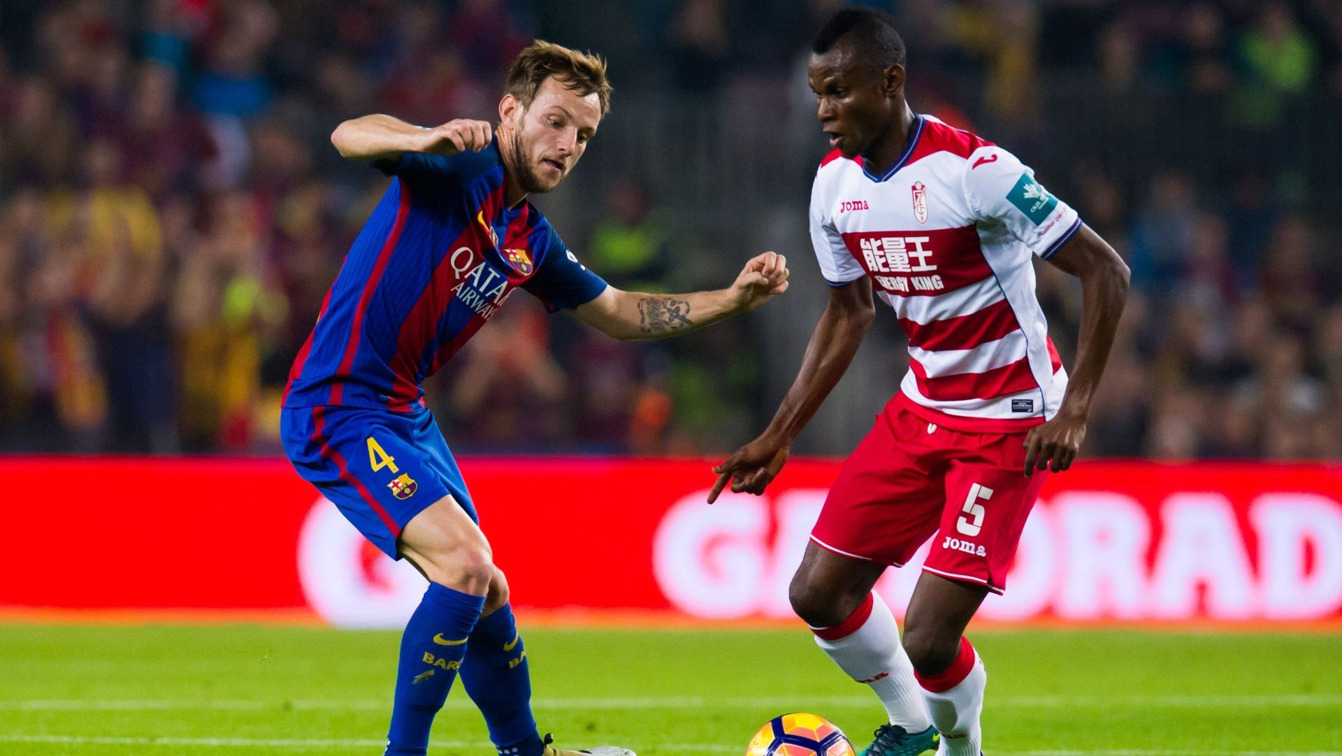 Ivan Rakitic of Barcelona, Henry Uche Agbo of Granada