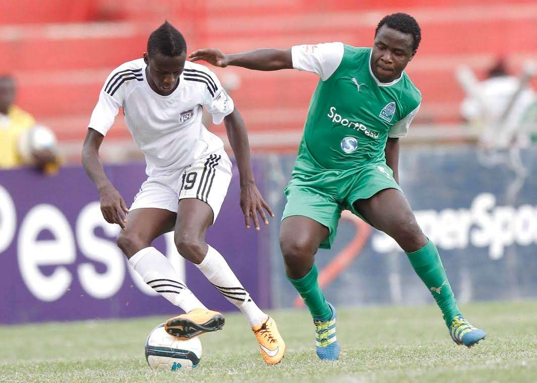 Gor Mahia midfielder Collins 'Gattuso' Okoth takes on a Nairobi City Stars player