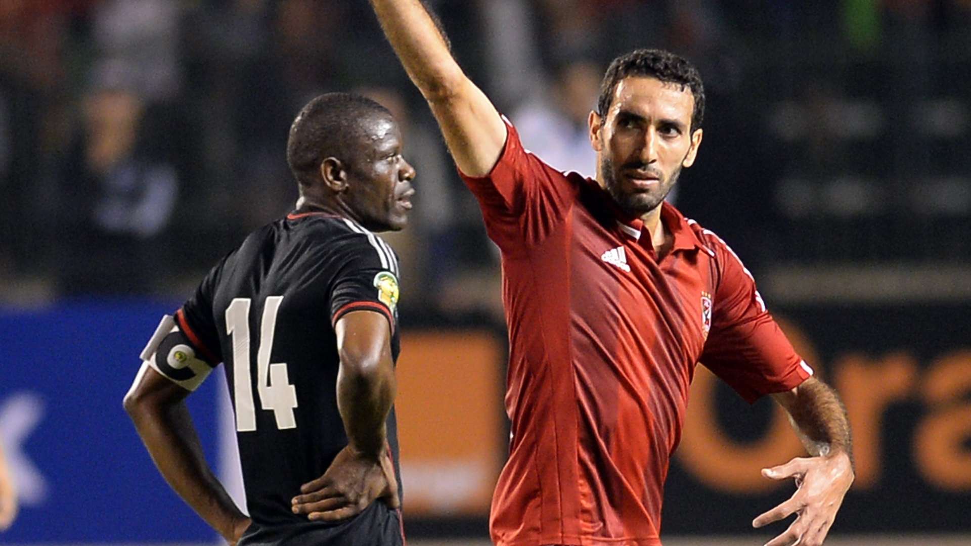 Mohamed Aboutrika of Al Ahly and Lucky Lekgwathi of Orlando Pirates