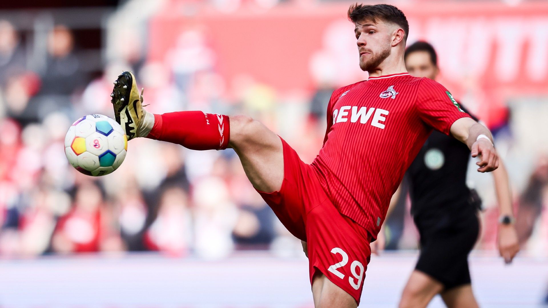 Jan Thielmann of 1.FC Köln handles the ball 