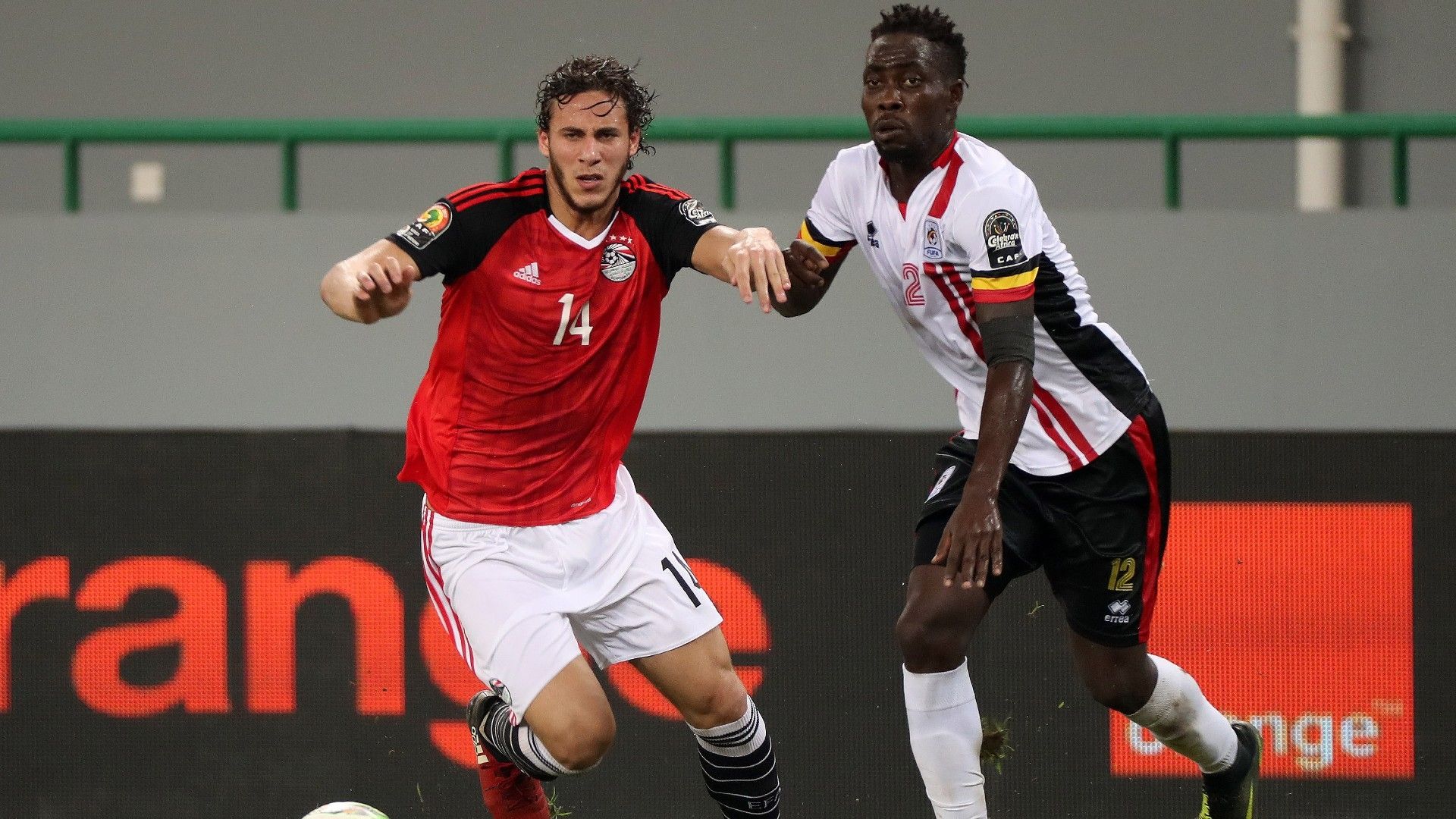 Ramadan Sobhi of Egypt evades challenge from Joseph Ochaya.