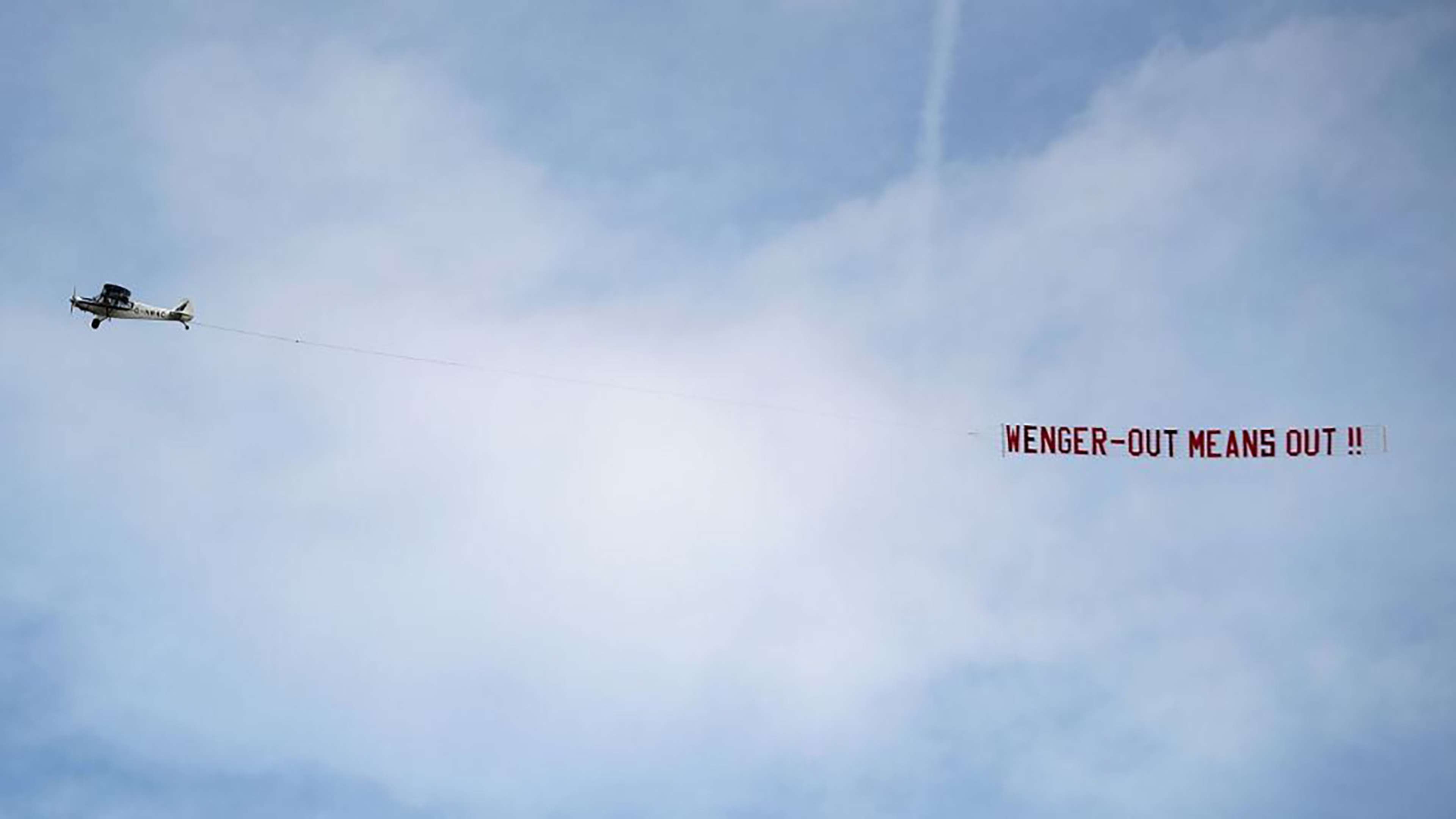 Wenger Out banner Arsenal