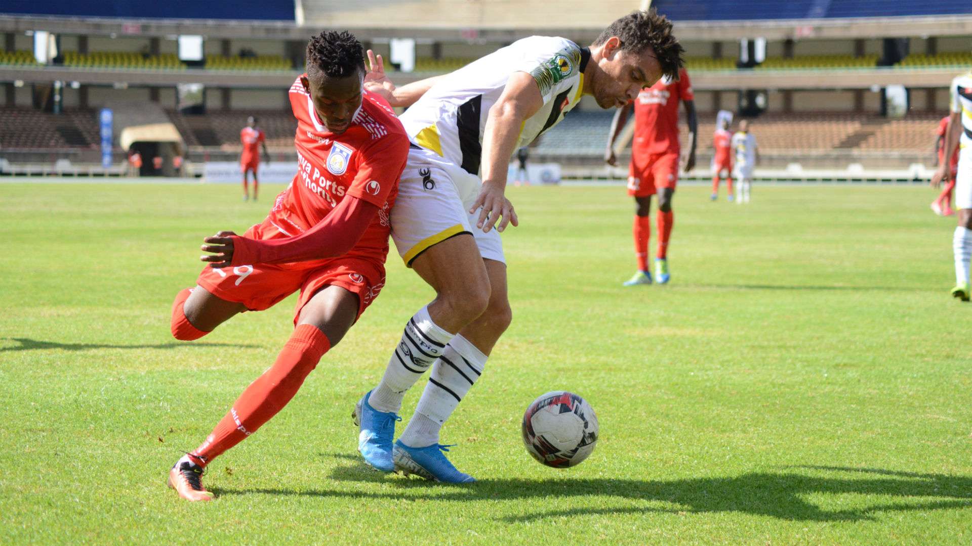 Bandari's FC Hassan Abdalla tussles for the ball against USB Guerdane Ghazi Abderazek.