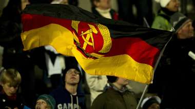 DDR fans with flag