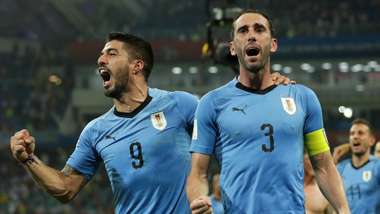 Luis Suárez, Diego Godin