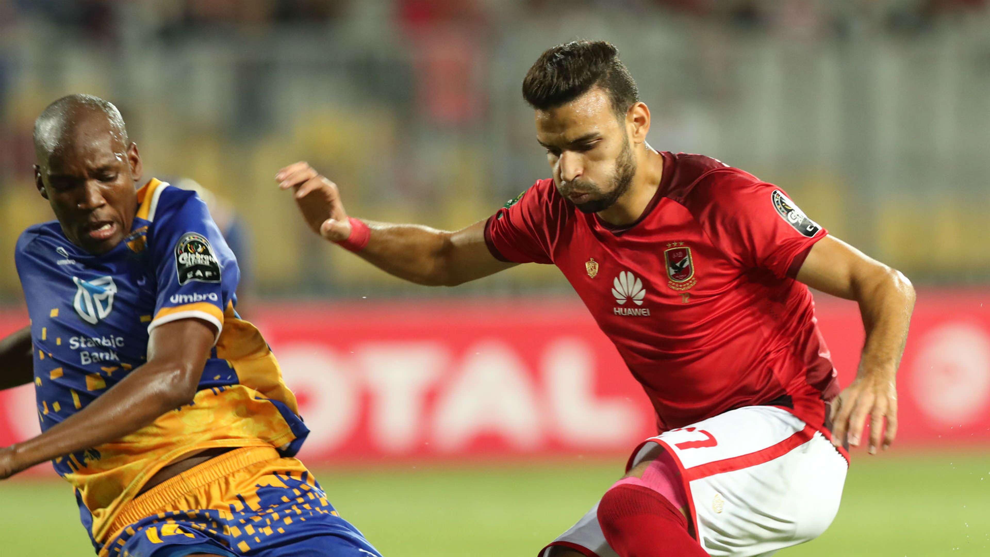 Al Ahly player Mohamed Gaber (R) in action against Township Rollers player Obuile Ncenga (L) , July 2018