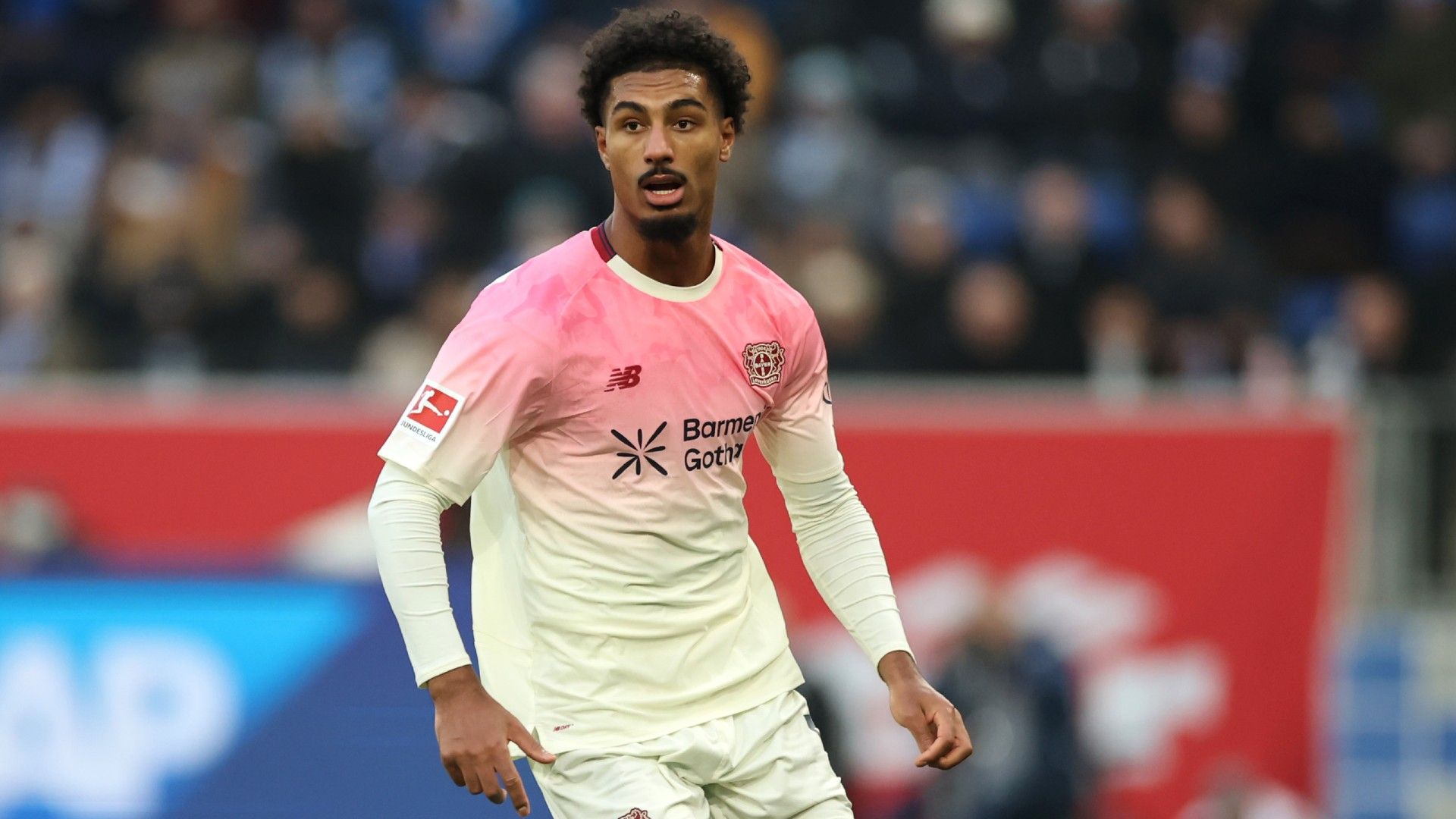Loic Bade of Bayer 04 Leverkusen controls the ball