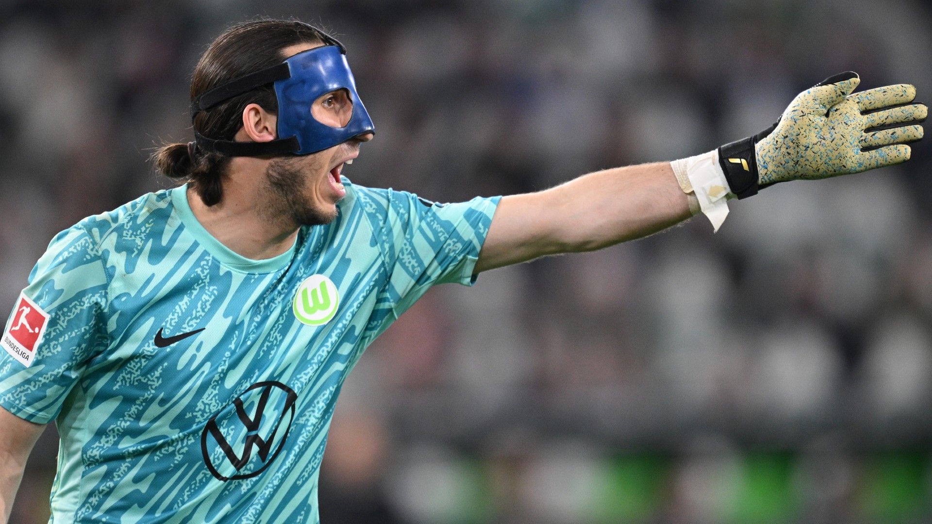  Kamil Grabara of Wolfsburg shouts during the Bundesliga match