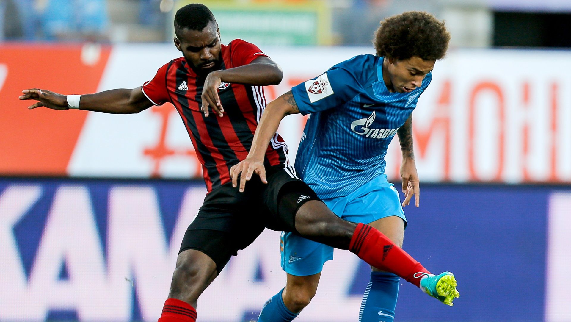 Brian Idowu of Amkar Perm & Axel Witsel of Zenit St Petersburg