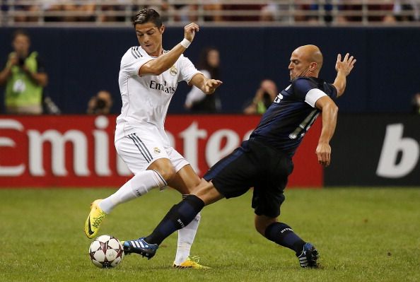 Cristiano Ronaldo; Esteban Cambiasso Real Madrid CF v FC Internazionale Milano - Pre-Season Friendly