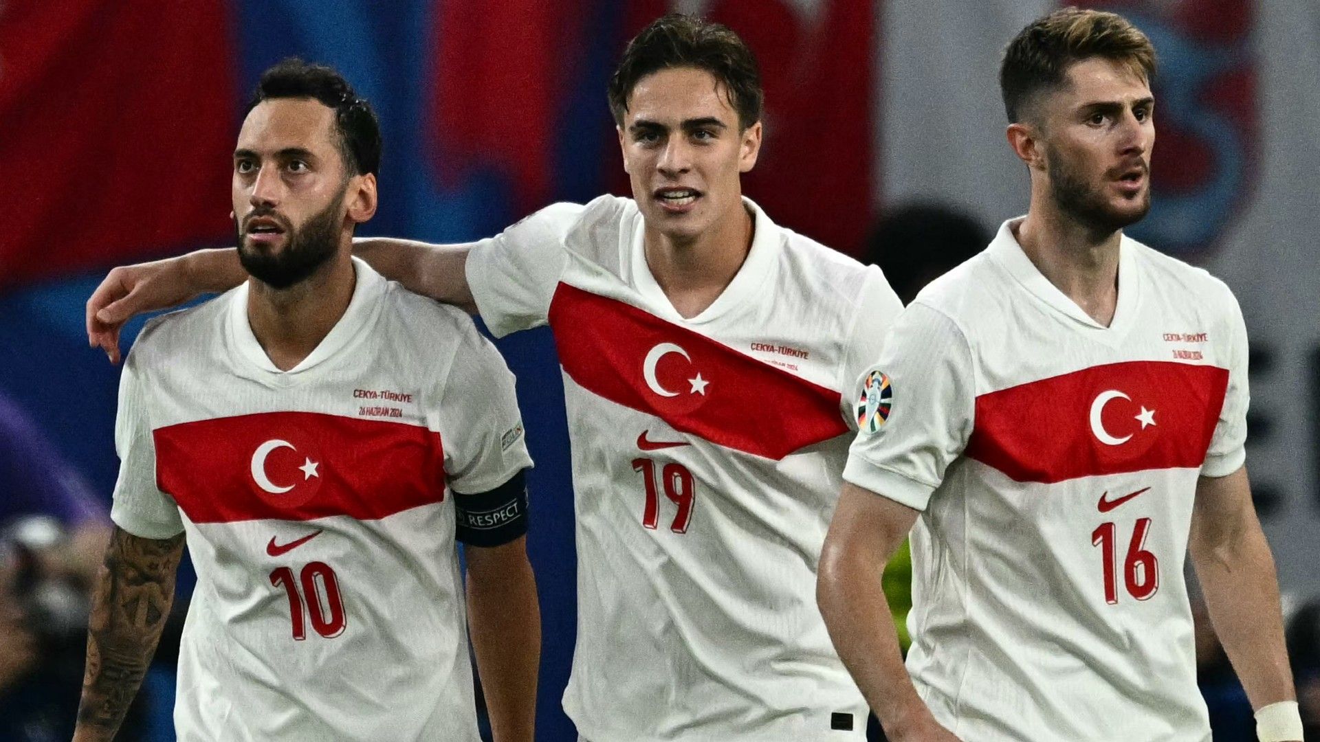  Turkey's midfielder #10 Hakan Calhanoglu (L) celebrates scoring