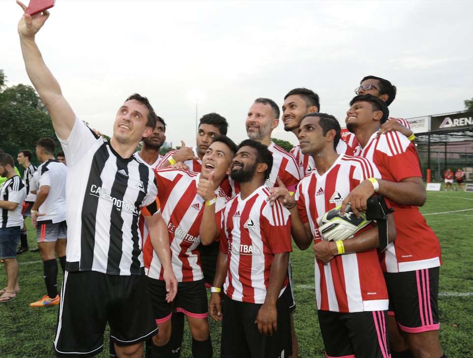 Gary Neville celebrates with his team mates from ProFut5al during the CF  Cup Grand Final.