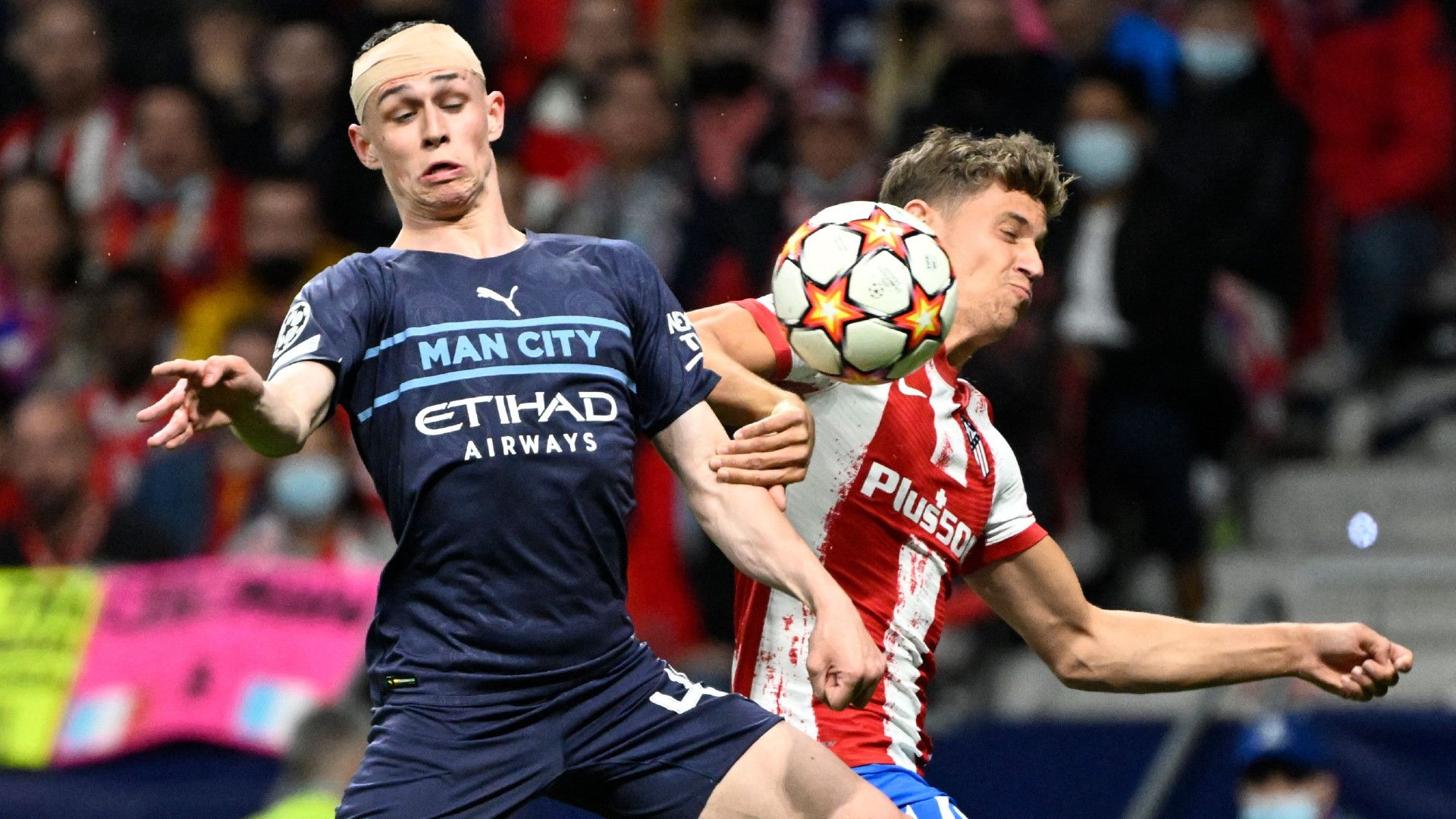 PHIL FODEN MANCHESTER CITY MARCOS LLORENTE ATLETICO MADRID CHAMPIONS LEAGUE 13042022
