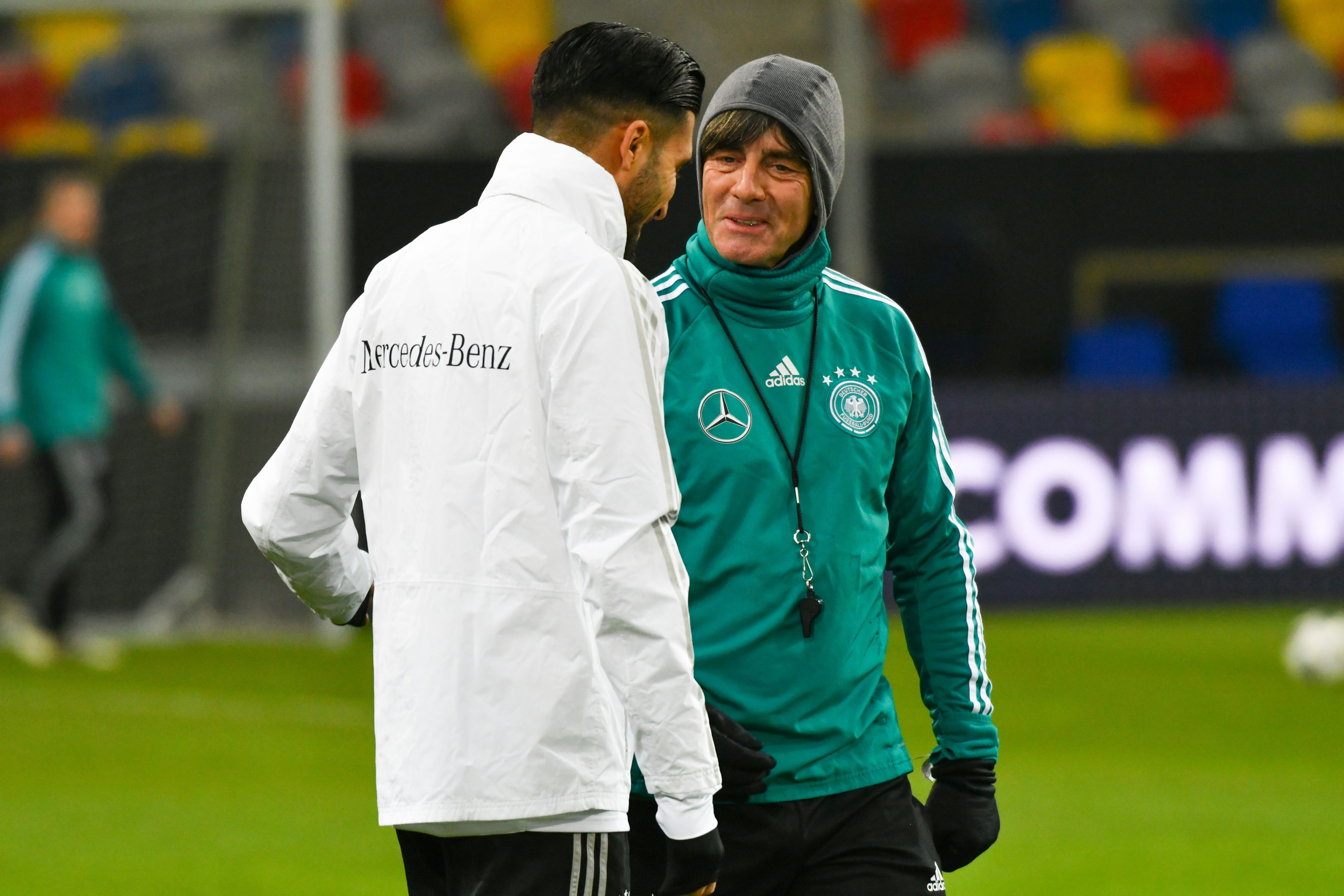 Emre Can with Joachim Low