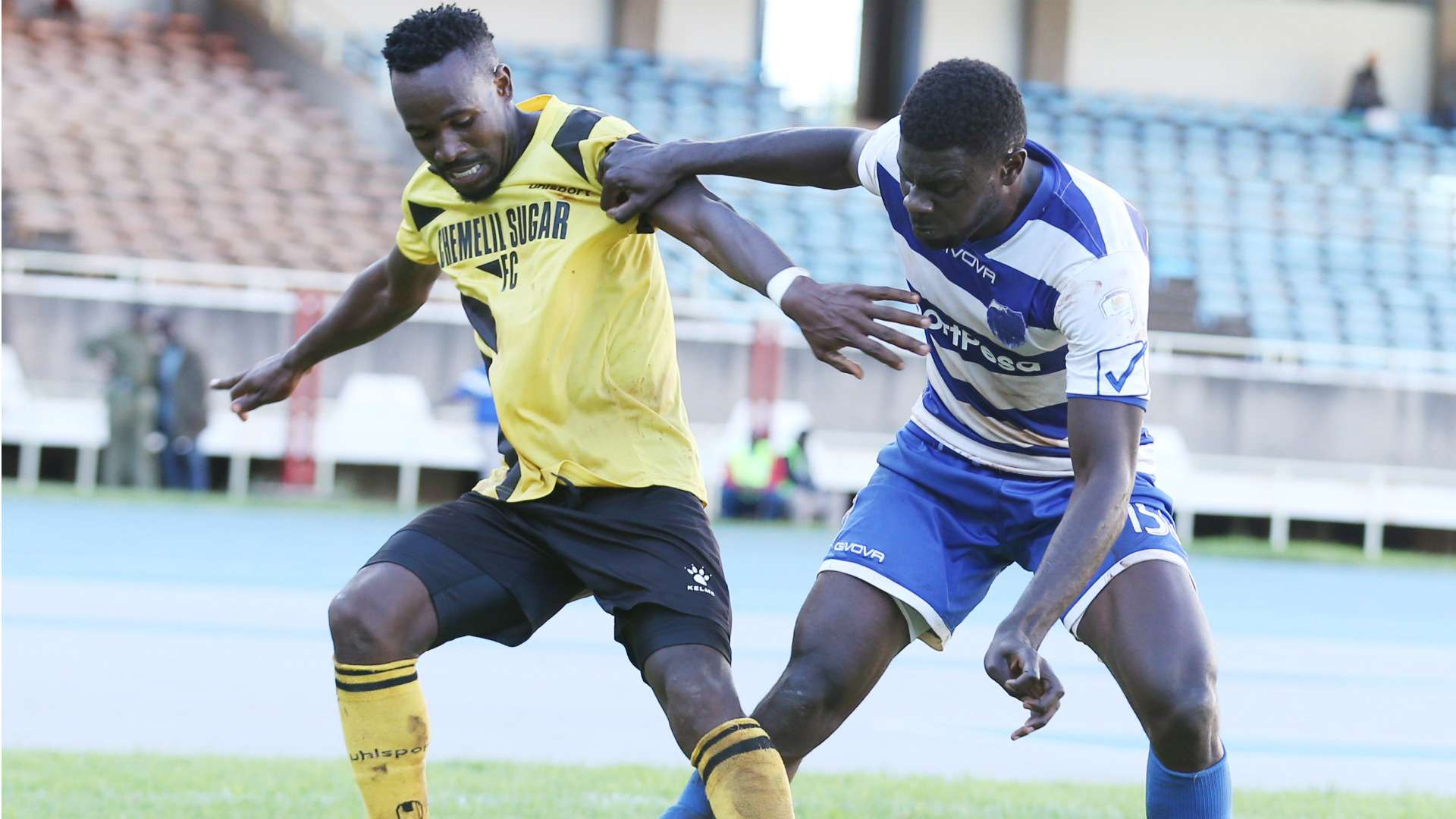 Collins Neto (L) of Chemelil Sugar and Salim Abdallah of AFC Leopards