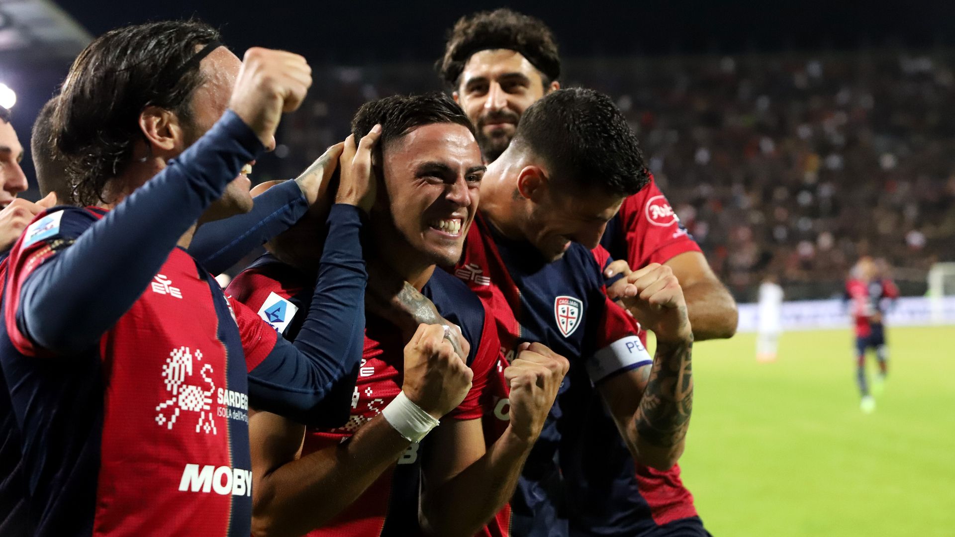 Cagliari celebrates goal against Milan