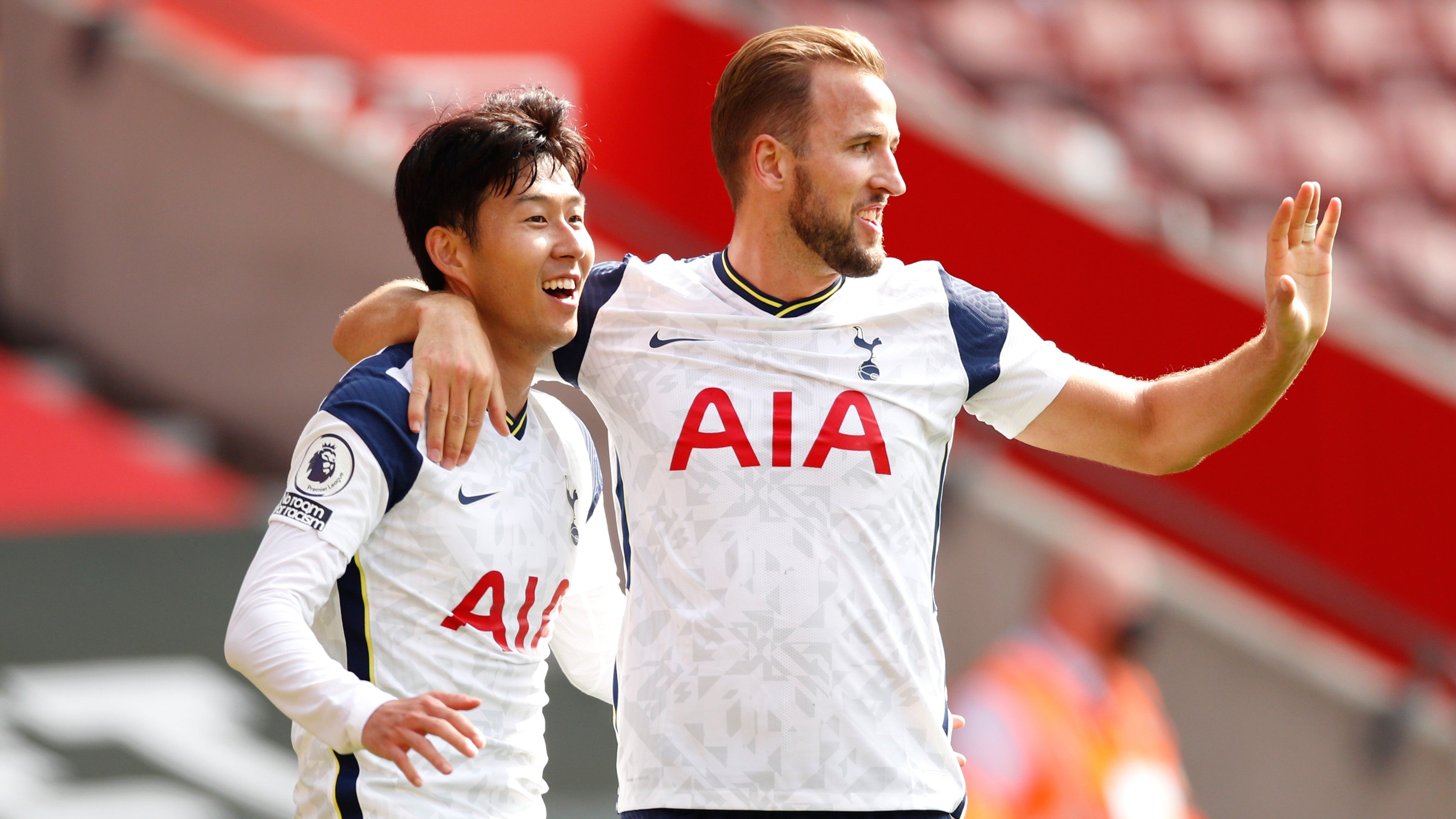 Heung-Min Son of Tottenham Hotspur celebrates with teammate Harry Kane