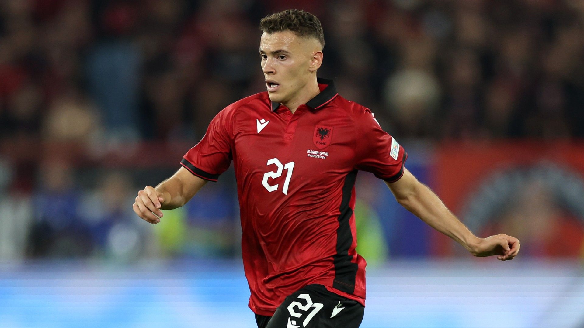 Kristjan Asllani of Albania controls the ball 