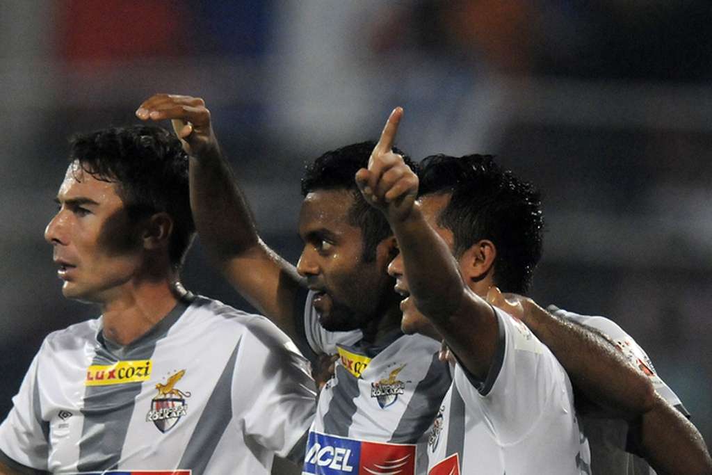 Cavin Lobo of Atletico de Kolkata celebrates goal with teammates  during ISL match against FC Goa
