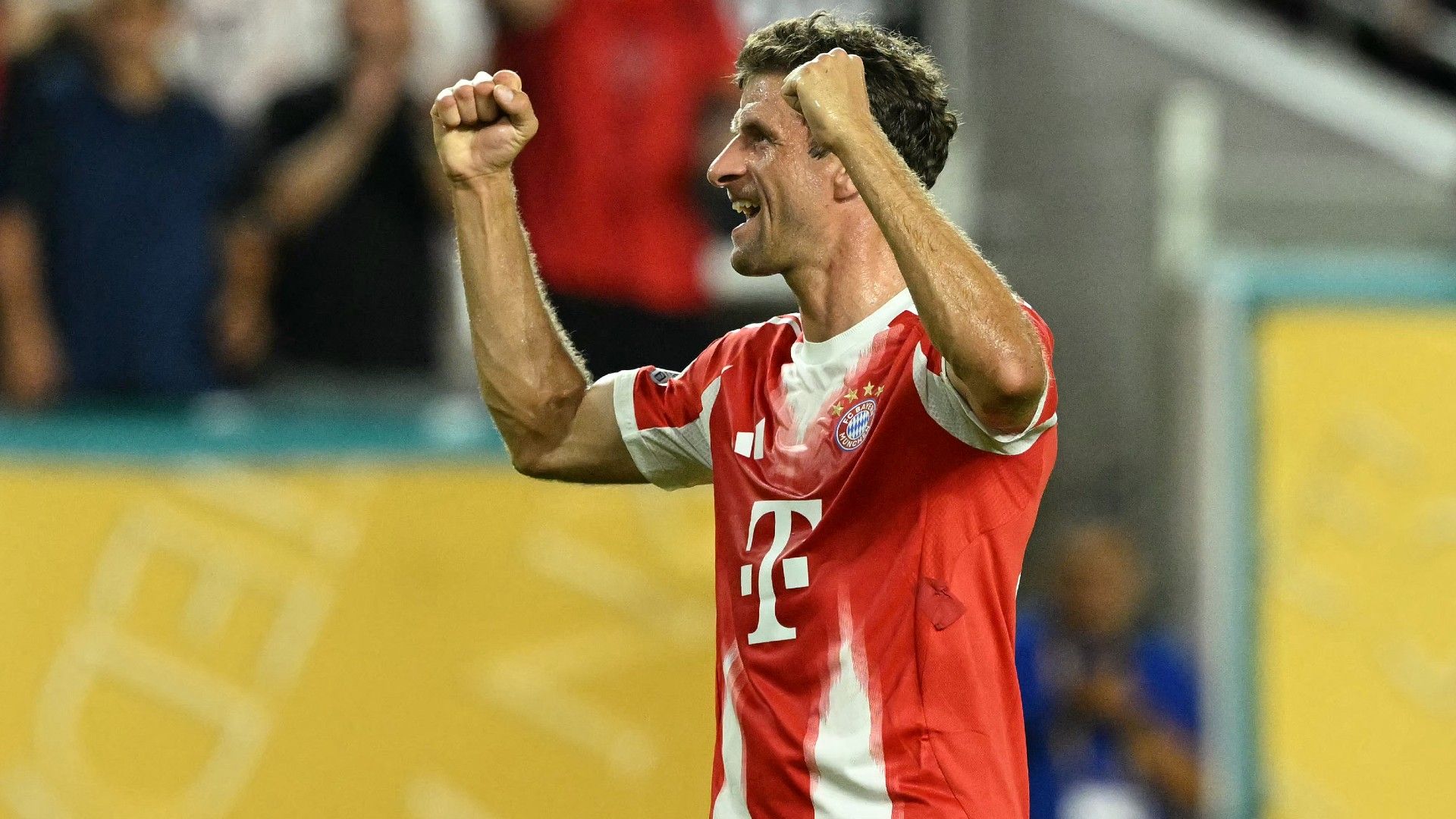 Bayern Munich's German forward #25 Thomas Mueller reacts after winning