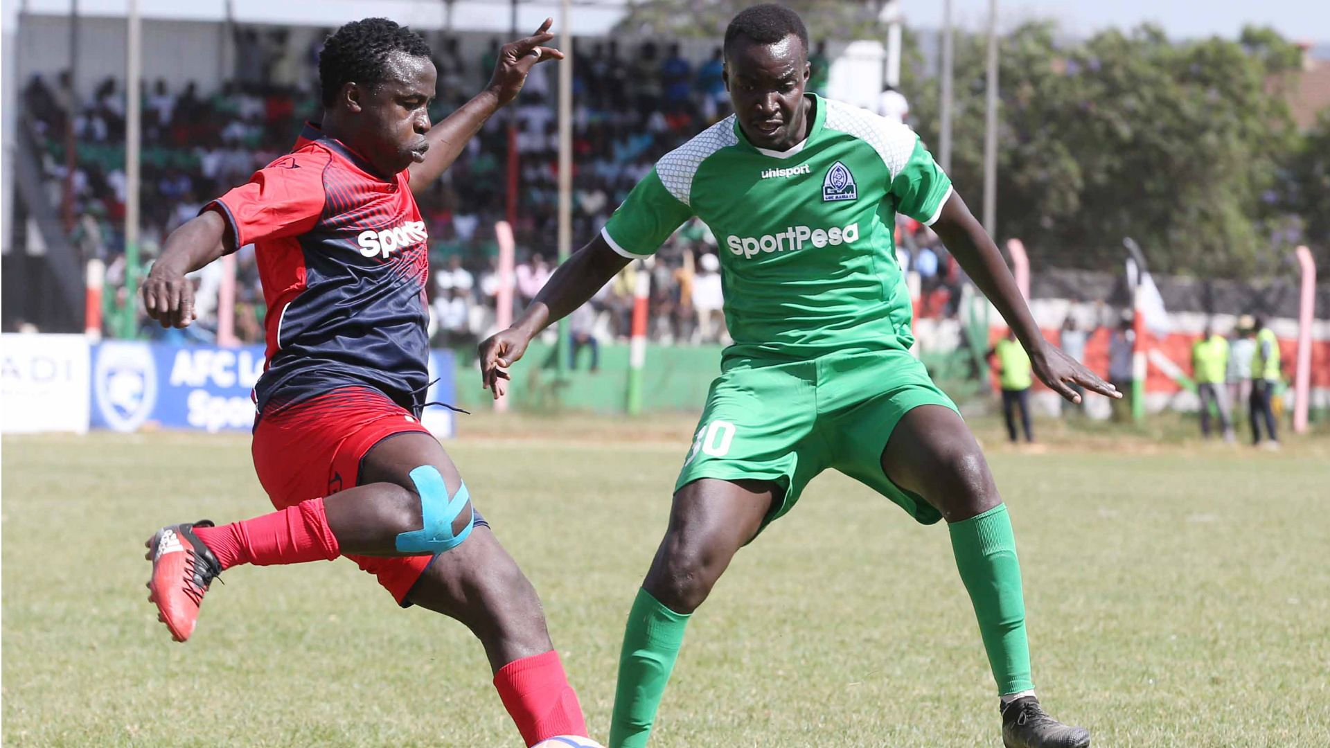 Gor Mahia midfielder Humphrey Mieno v Collins Okoth of AFC Leopards.