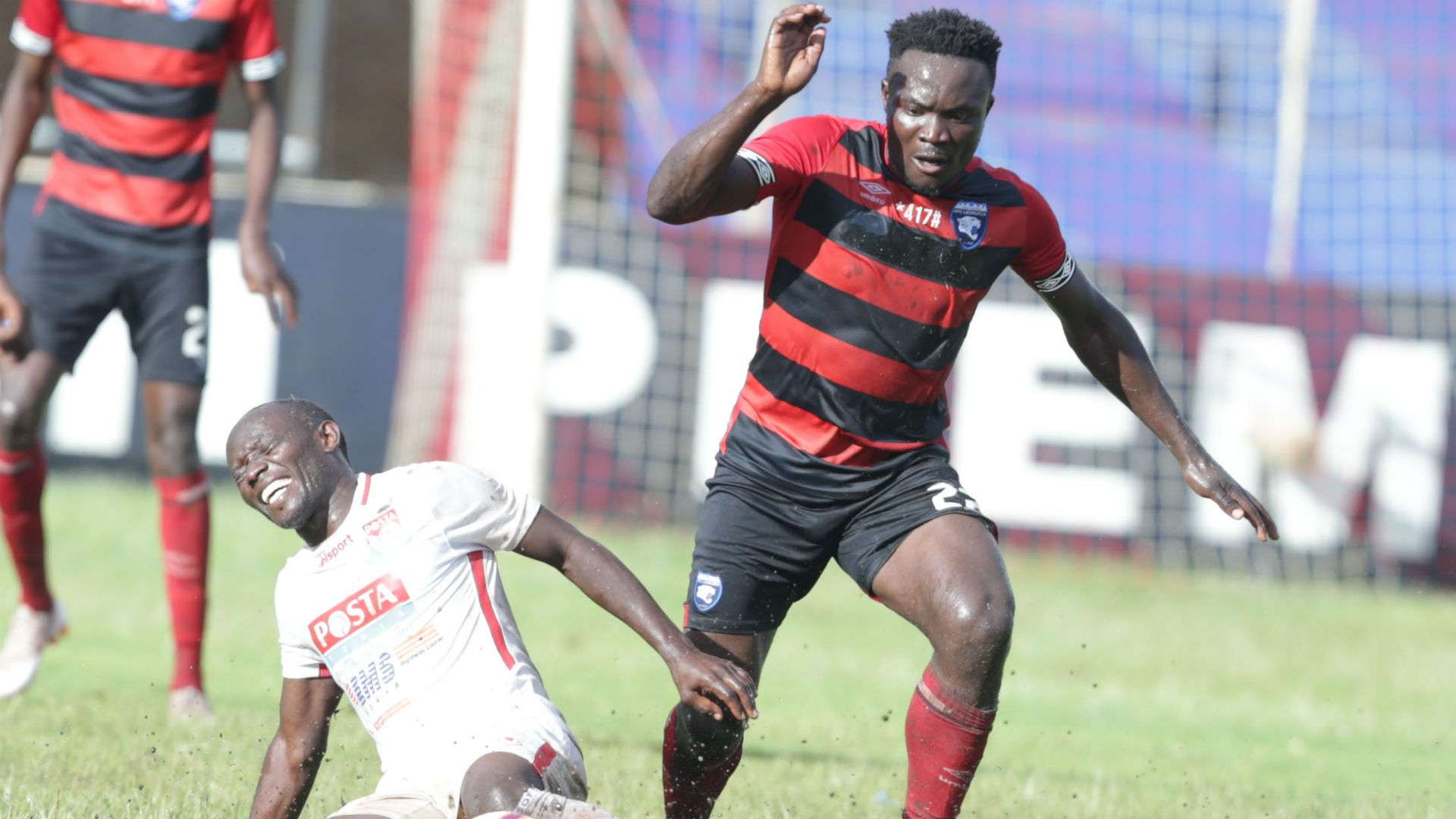 Gearson Likonoh of Posta Rangers and Collins Shivachi of AFC Leopards.