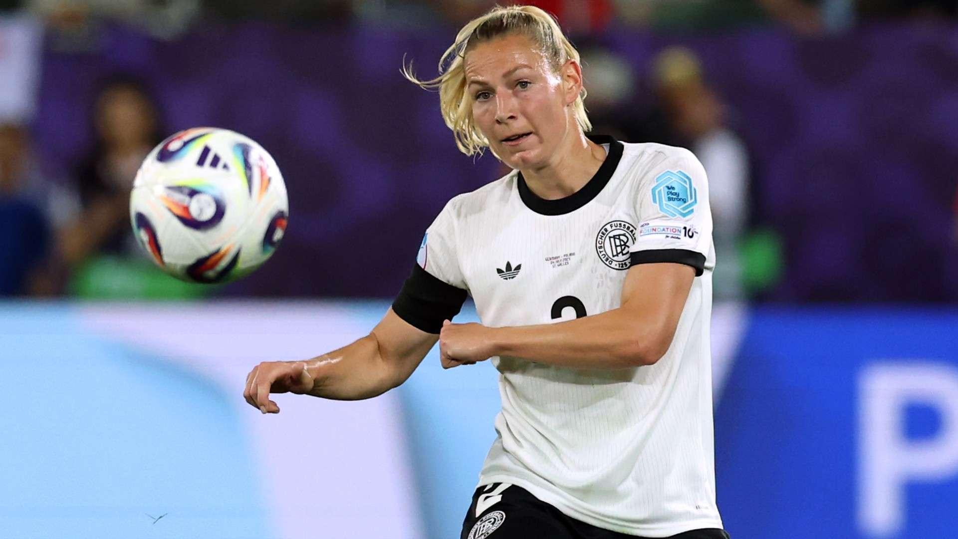 Sarai Linder of Germany passes the ball
