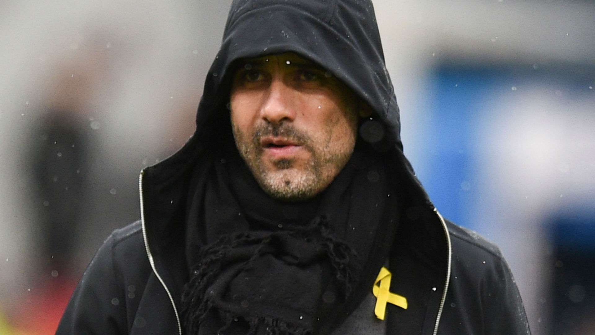 Pep Guardiola Man City yellow ribbon