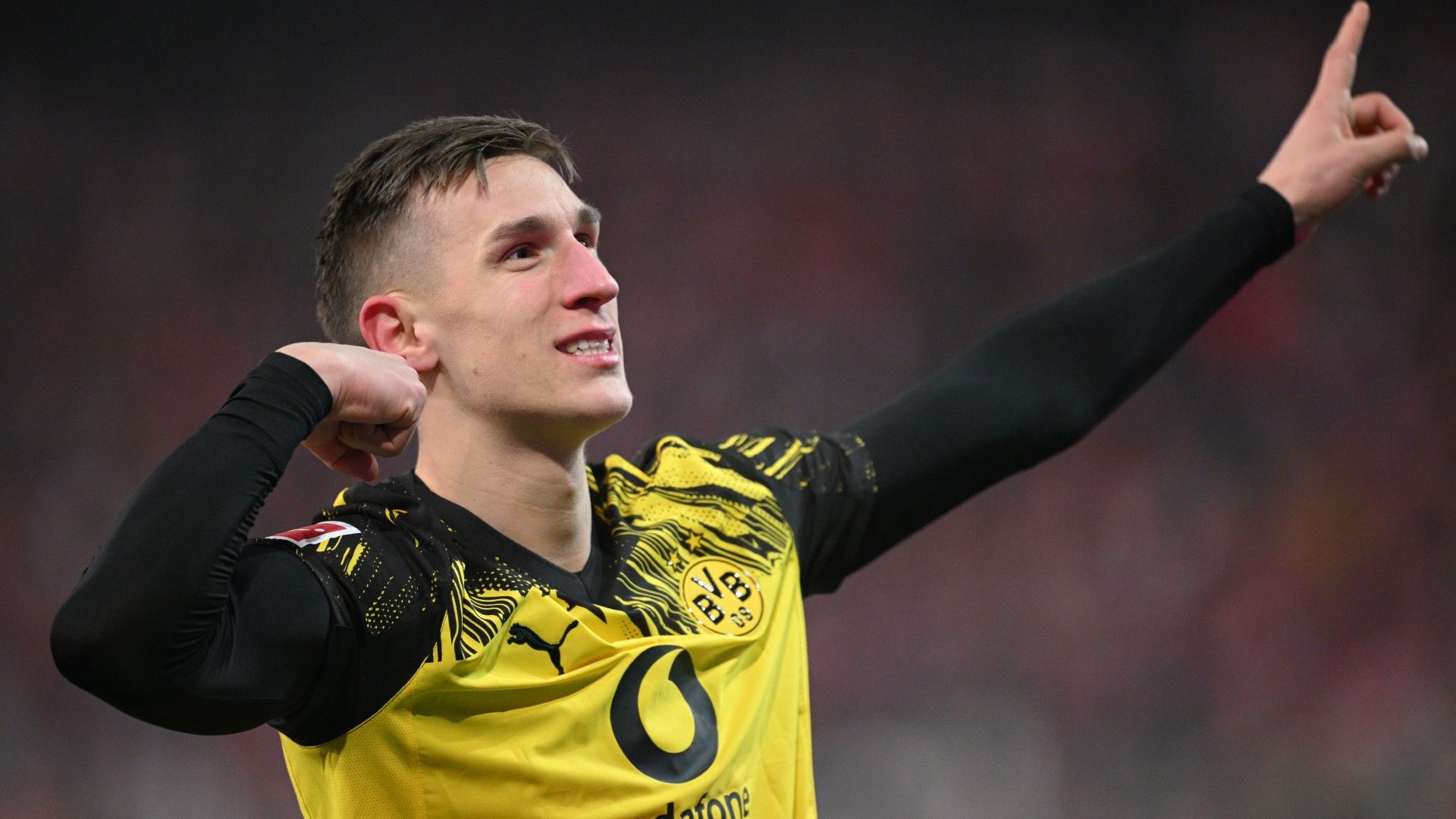 Nico Schlotterbeck of Dortmund celebrates scoring