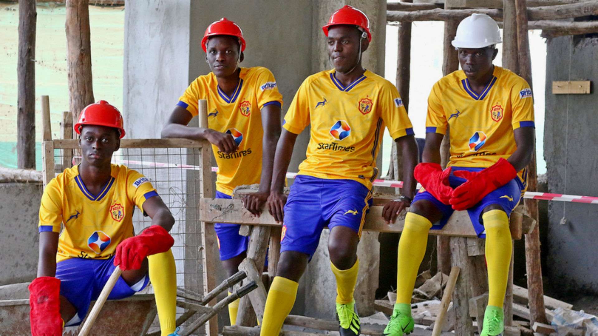 KCCA FC players model new jersey.