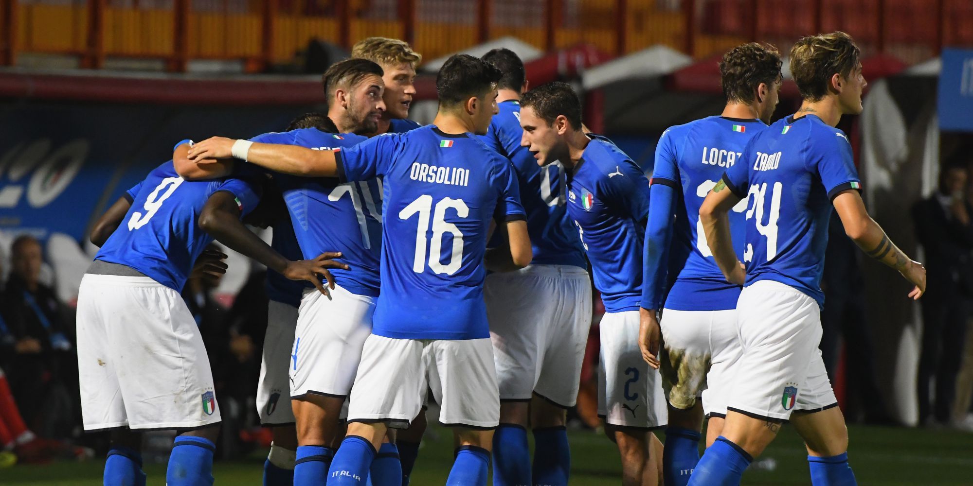 Italian players celebrating Italy U21 Tunisia U21