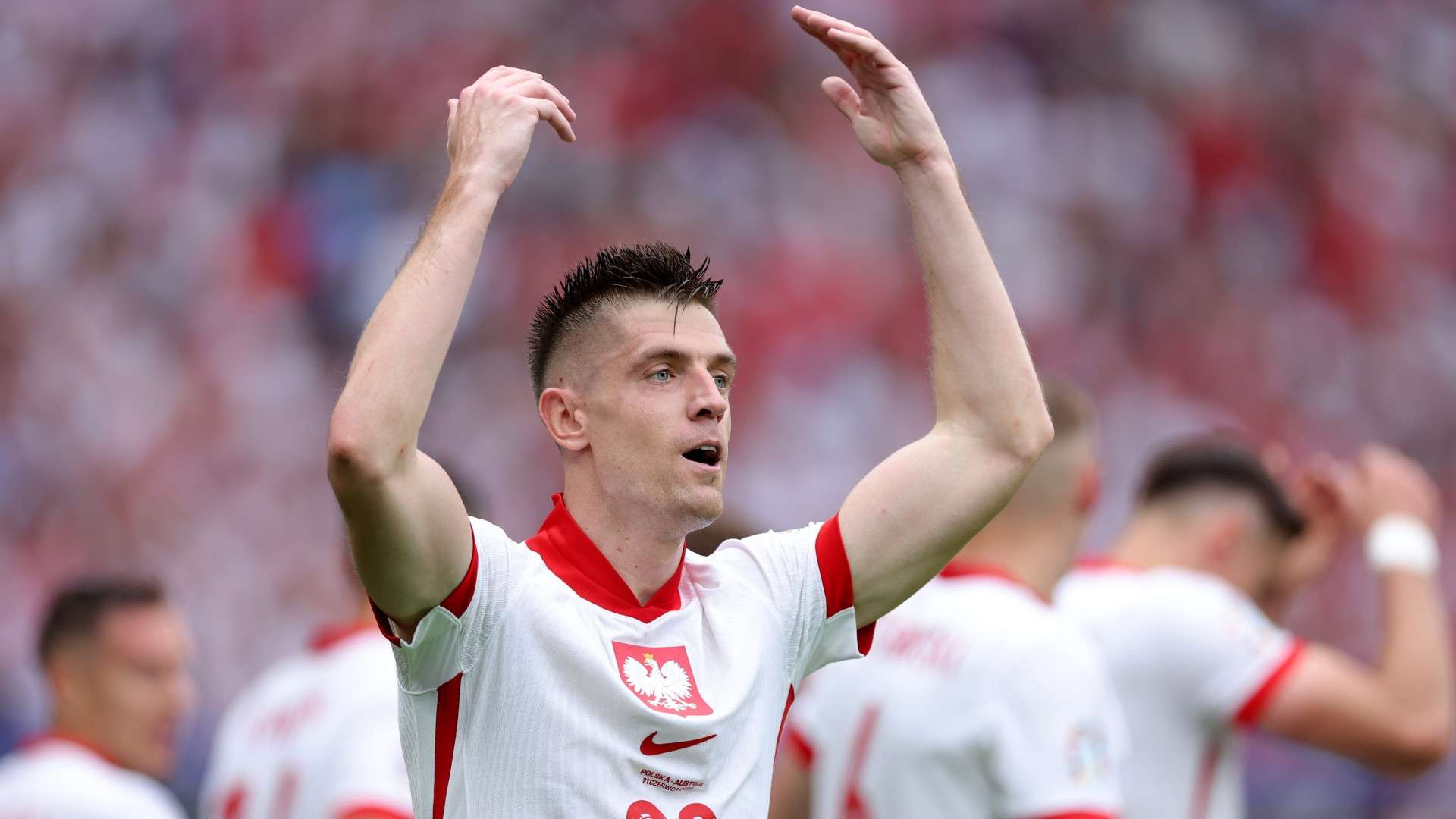 Krzysztof Piatek of Poland celebrates scoring his team's first goal